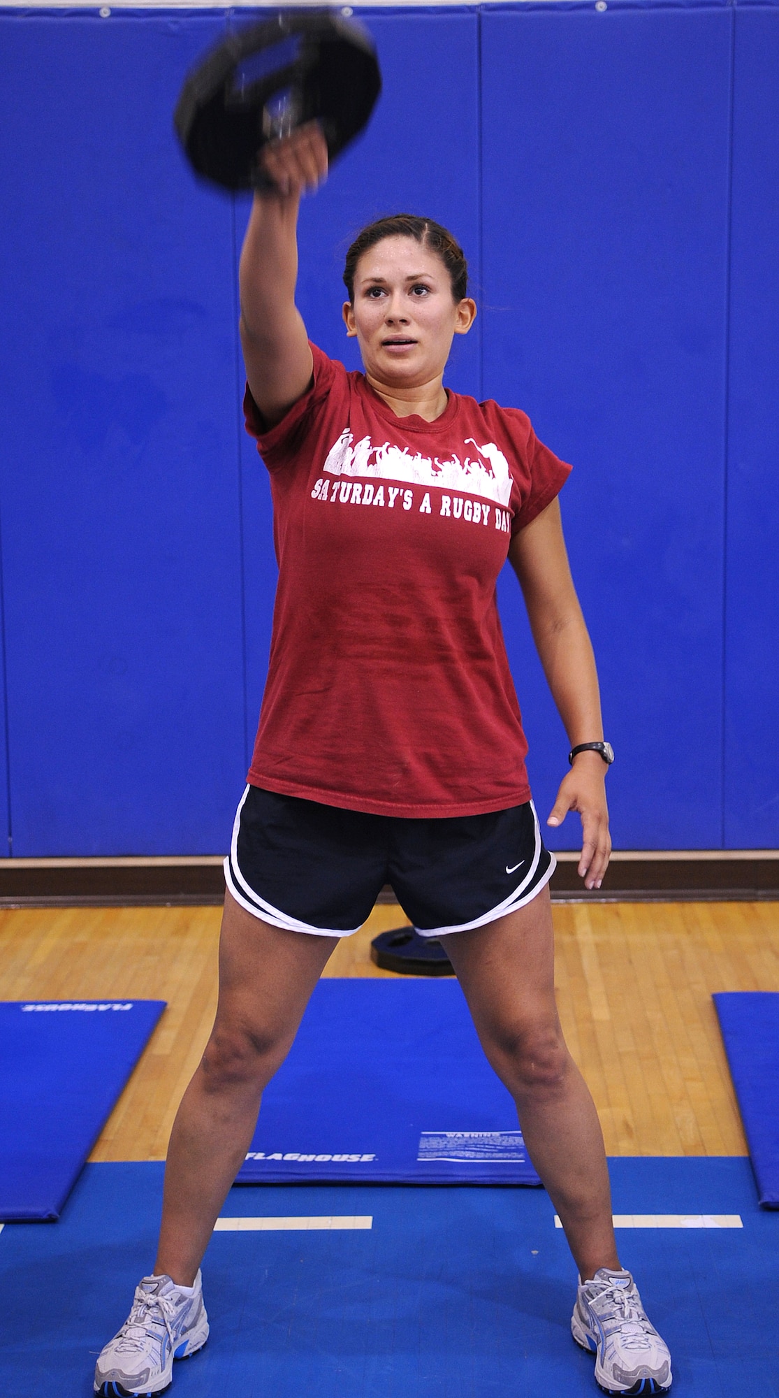 LANGLEY AIR FORCE BASE, Va. -- 1st Lt. Krista Barajas, 633d Force Support Squadron fitness assessment cell officer in charge, participates in Prism Sports May 18.  Prism Sports is a high intensity workout designed to develop an athlete’s power, movement biomechanics, and strength while also reducing the likelihood of non-contact injury by teaching correct exercise technique, increasing lean body mass, gaining strength and flexibility, correcting postural deviations, and developing the body’s metabolic energy system.  (U.S. Air Force Photo/Staff Sgt. Christina M. Styer)
