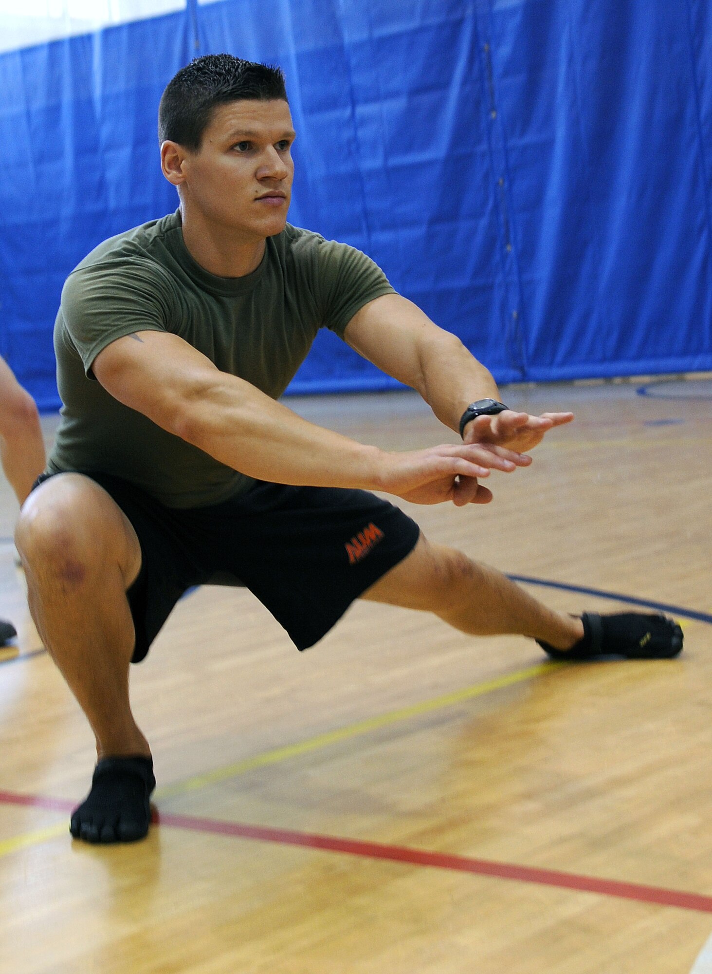 LANGLEY AIR FORCE BASE, Va. – 2nd Lt. David Earl, 633d Contracting Squadron contract specialist, participates in Prism Sports May 18.  Prism Sports is a high intensity workout designed to develop an athlete’s power, movement biomechanics, and strength while also reducing the likelihood of non-contact injury by teaching correct exercise technique, increasing lean body mass, gaining strength and flexibility, correcting postural deviations, and developing the body’s metabolic energy system.  (U.S. Air Force Photo/Staff Sgt. Christina M. Styer)