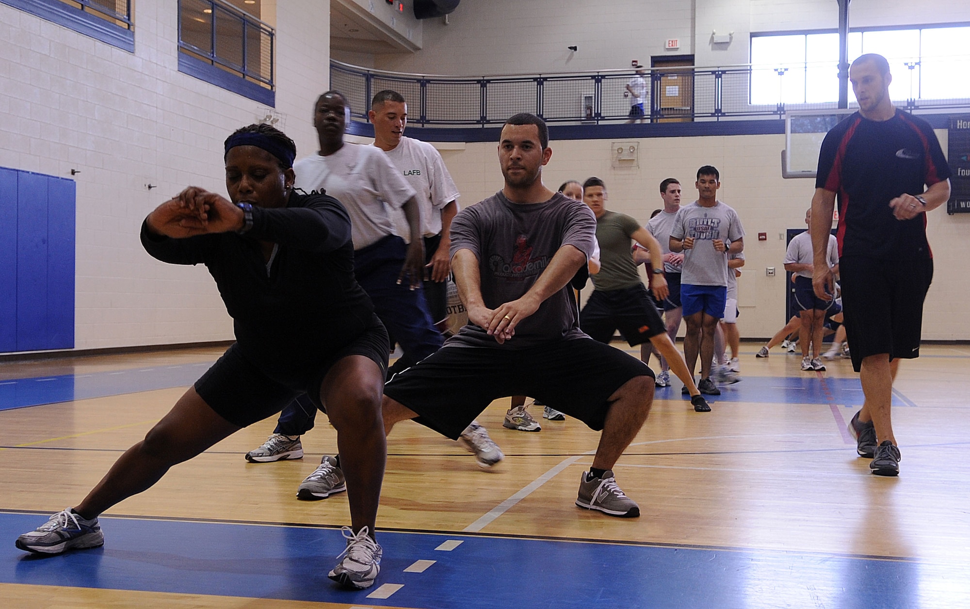 LANGLEY AIR FORCE BASE, Va. -- Team Langley members participate in Prism Sports May 18.  Prism Sports is a high intensity workout designed to develop an athlete’s power, movement biomechanics, and strength while also reducing the likelihood of non-contact injury by teaching correct exercise technique, increasing lean body mass, gaining strength and flexibility, correcting postural deviations, and developing the body’s metabolic energy system.  (U.S. Air Force Photo/Staff Sgt. Christina M. Styer)