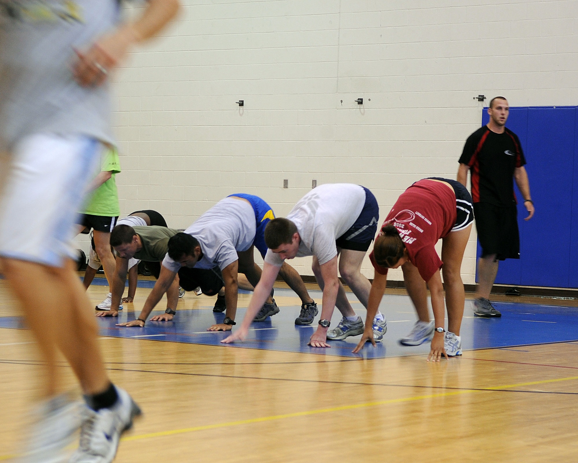 LANGLEY AIR FORCE BASE, Va. -- Team Langley members participate in Prism Sports May 18.  Prism Sports is a high intensity workout designed to develop an athlete’s power, movement biomechanics, and strength while also reducing the likelihood of non-contact injury by teaching correct exercise technique, increasing lean body mass, gaining strength and flexibility, correcting postural deviations, and developing the body’s metabolic energy system.  (U.S. Air Force Photo/Staff Sgt. Christina M. Styer)