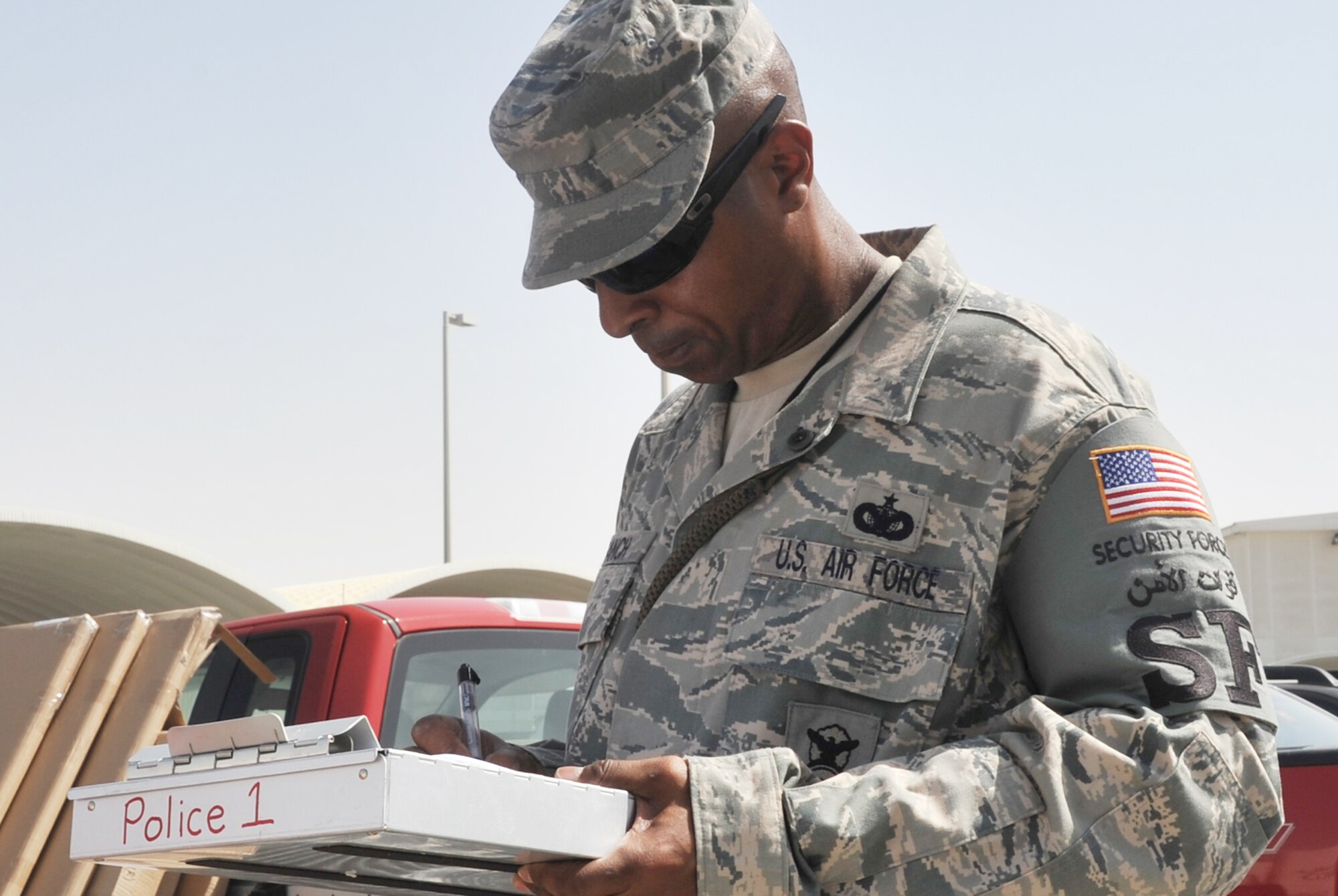 Tech. Sgt. Albert Branch, security forces craftsman with the 380th Expeditionary Security Forces Squadron, works at a security forces scene during operations for the 380th Air Expeditionary Wing at a non-disclosed base in Southwest Asia on May 24, 2010. Sergeant Branch is deployed from the 4th Security Forces Squadron at Seymour-Johnson Air Force Base, N.C., and his hometown is Panama City, Fla. The 380th ESFS, as part of the 380th AEW, supports operations Iraqi Freedom and Enduring Freedom and the Combined Joint Task Force-Horn of Africa. (U.S. Air Force Photo/Master Sgt. Scott T. Sturkol/Released)