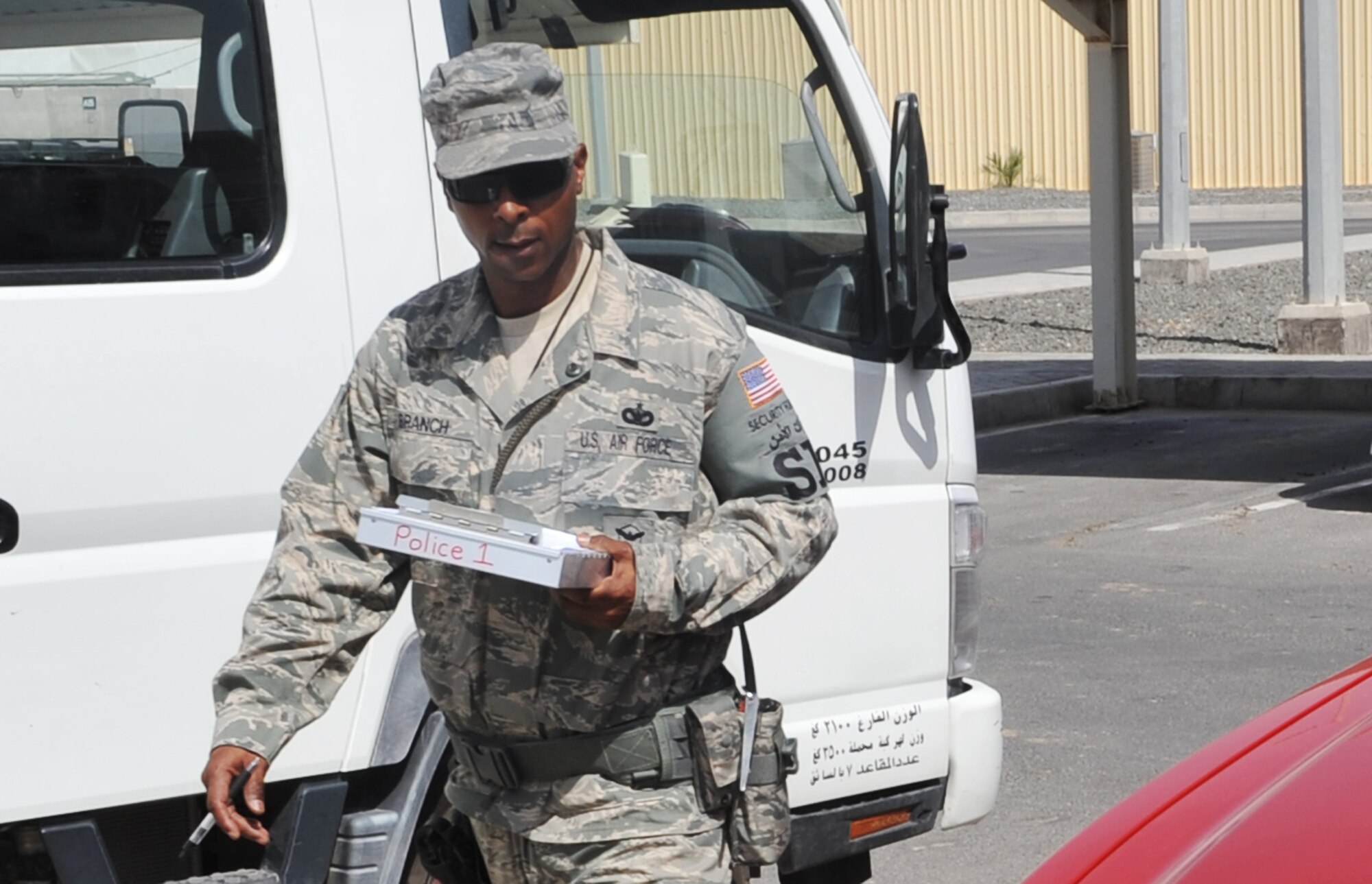 Tech. Sgt. Albert Branch, security forces craftsman with the 380th Expeditionary Security Forces Squadron, works at a security forces scene during operations for the 380th Air Expeditionary Wing at a non-disclosed base in Southwest Asia on May 24, 2010. Sergeant Branch is deployed from the 4th Security Forces Squadron at Seymour-Johnson Air Force Base, N.C., and his hometown is Panama City, Fla. The 380th ESFS, as part of the 380th AEW, supports operations Iraqi Freedom and Enduring Freedom and the Combined Joint Task Force-Horn of Africa. (U.S. Air Force Photo/Master Sgt. Scott T. Sturkol/Released)