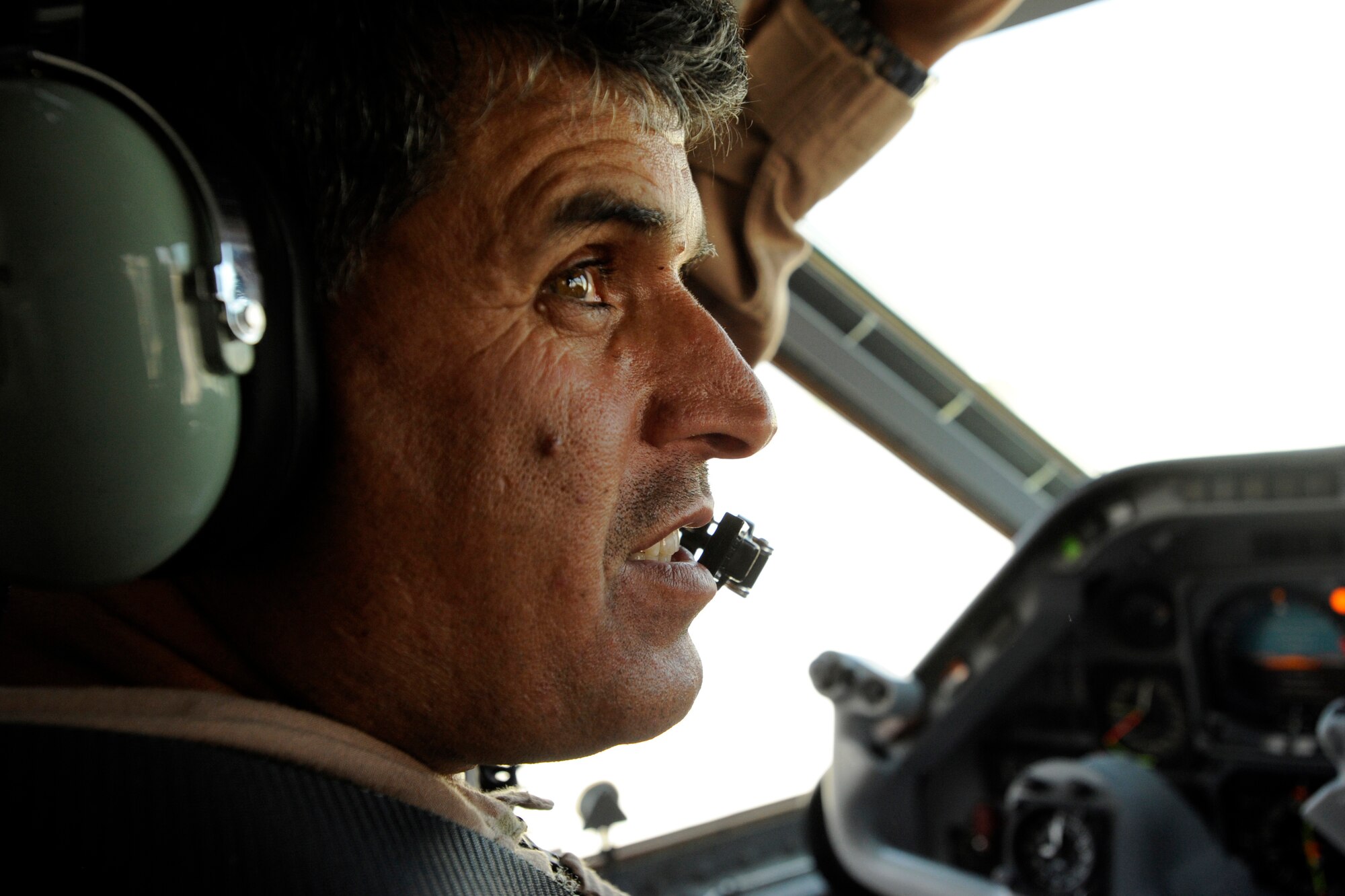 Capt. Mohammad-Shah, an Afghan National Army Air Corps C-27 pilot, prepares a C-27J for engine start-up May 15, 2010, at Kabul International Airport, Afghanistan. "The commitment our advisor has shown has been good," the captain said. "I have great faith in our new instructors and I have had the chance to fly with them and they show the same care for our people as our other instructors. It feels good to have people helping us to get better at flying the C-27 for Afghanistan." (U.S. Air Force/ Staff Sgt. Manuel J. Martinez/released)  
