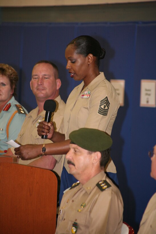 Master Gunnery Sgt. Charissa Howard, United States team, reads the Counseil International du Sport Militaire athletes’ oath during the opening ceremony of the tournament at the Cherry Point Marine Dome, May 26. Howard is 43 years old and has played in six CISM tournaments.