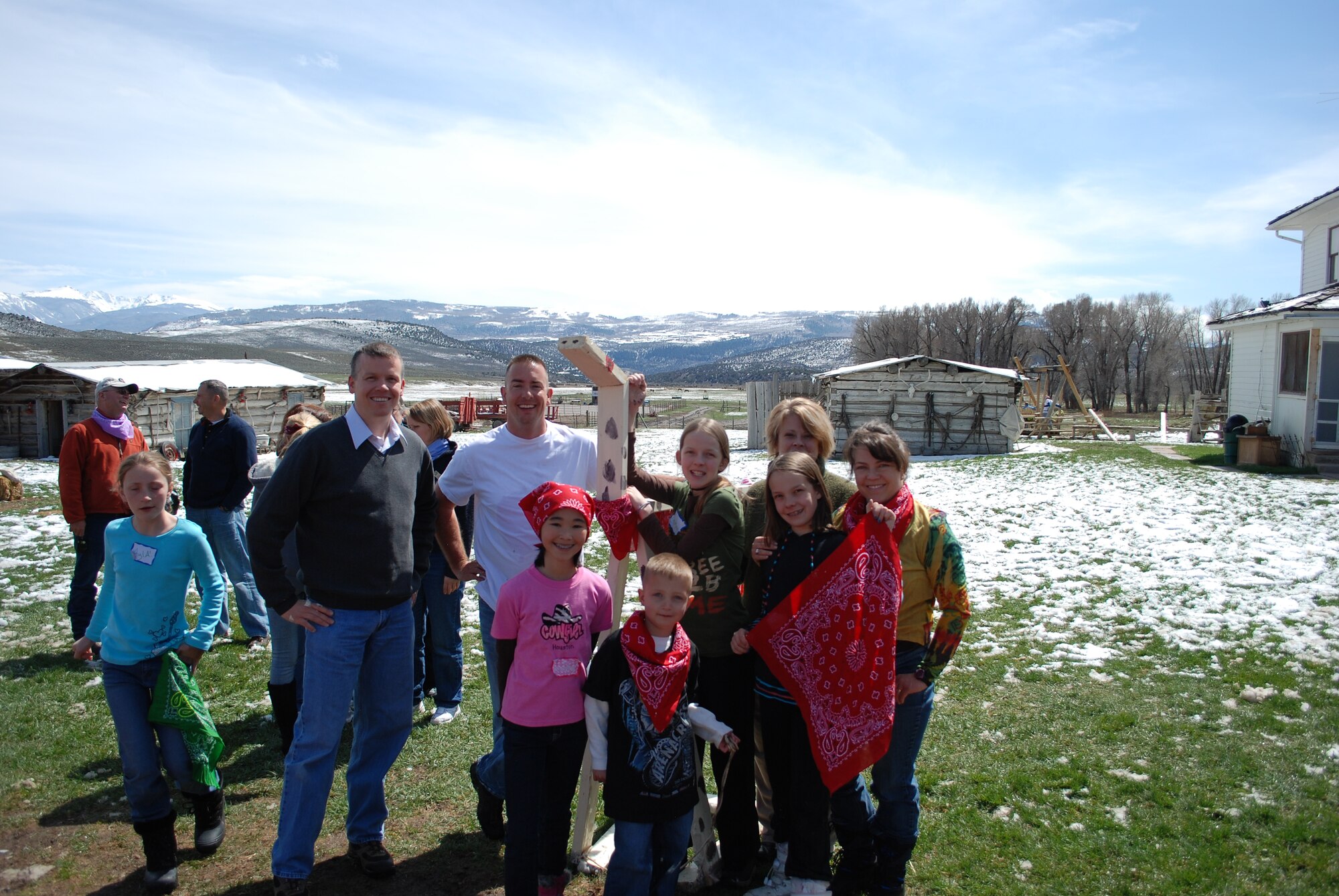 “Cookie,” the winning wooden race horse Yellow Ribbon Reintegration Program during a team building exercise, is surrounded by its creators April 24 at 4 Eagle Ranch near Vail, Colo. Air Force Reservists from the 302nd Airlift Wing and their families teamed up to build wooden horses during a Colorado National Guard YRRP post-deployment event. YRRP was established in 2007 to assist Guard and Reserve members as they return to their daily lives after being deployed to a combat zone. Members and families who have or will deploy are welcome and encouraged to participate in future YRRP events. The 302nd AW's Airman and Family Readiness Center can provide additional information on future programs. (U.S. Air Force photo)
