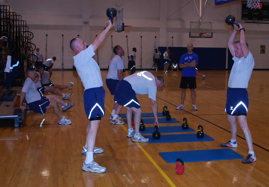 The commanders and chiefs of Sheppard Air Force Base, Texas, attack their weekly Combat Fit physical fitness session which is done every Wednesday morning at the Pitsenbarger gym at Sheppard May 26, 2010.  Sheppard's Combat Fit is a circuit-training program designed by HAWC fitness professionals to strengthen core muscles and build an overall stronger body.  (U.S. Air Force photo/Tech. Sgt. Vernon Cunningham)