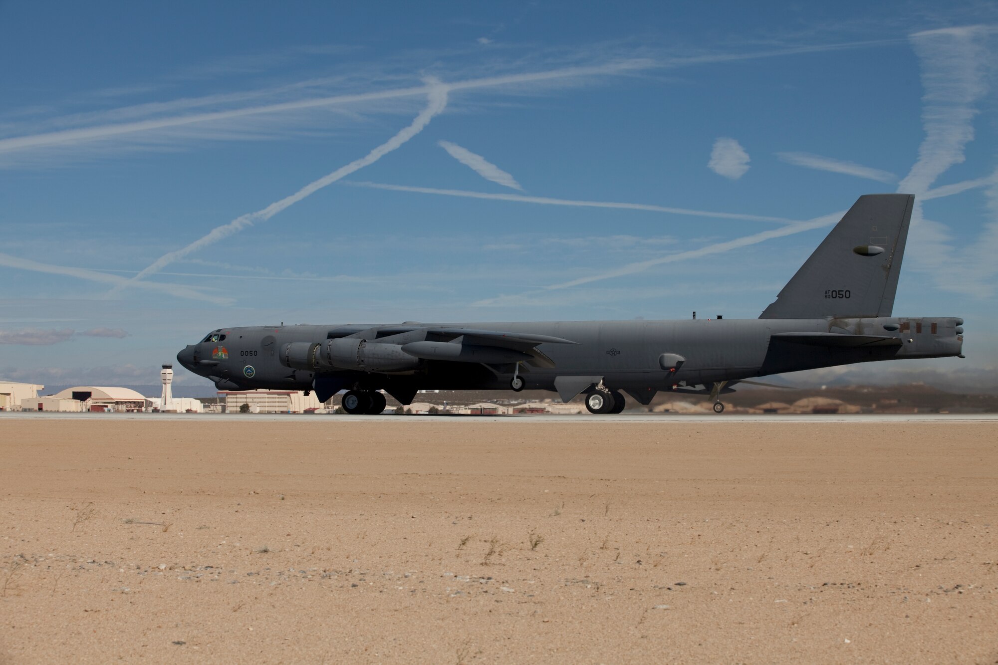 The B-52H taxis for takeoff with the X-51A WaveRider scramject.  The experimental engine was successfully launched over the Pacific Ocean and transmitted important test data to ground stations before splashing down into the ocean and breaking apart.  (Air Force photo by Greg Davis)