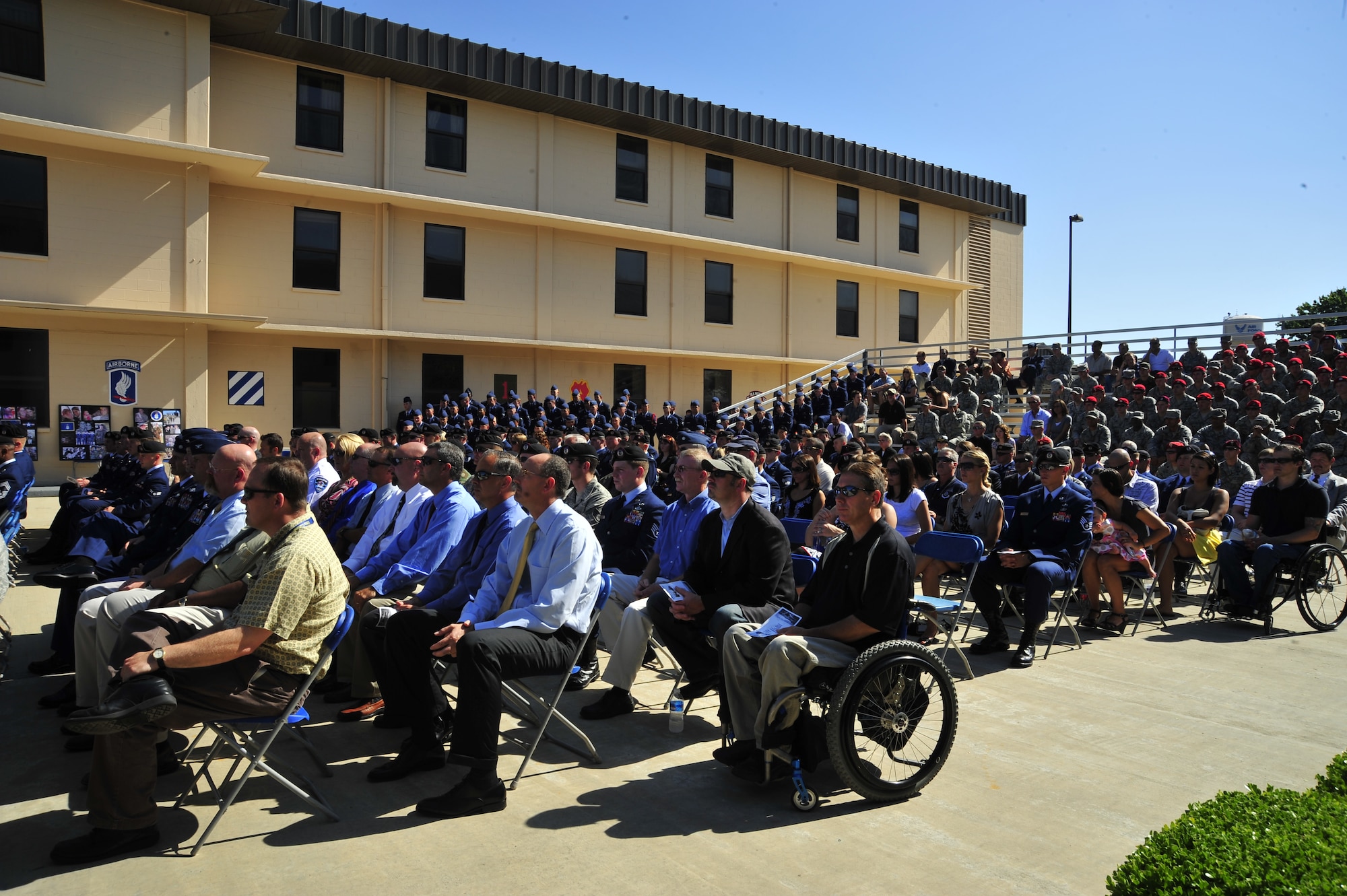 More than 400 Airmen, families, friends, and former Tactical Air Control Party Members gathered at the TACP Memorial Wall, outside the schoolhouse May 26, 2010, to honor the sacrifice of a fallen TACP Airmen, who was killed in action during a mission in support of Operation Enduring Freedom January 3, 2010. Senior Airman Brad Smith, a TACP Airman assigned to the 10th Air Support Operations Squadron, was killed along with three other U.S. servicemembers when his unit encountered multiple improvised explosive devices Jan. 3, 2010. (DoD photo by U.S. Air Force Senior Airman Sheila Devera)