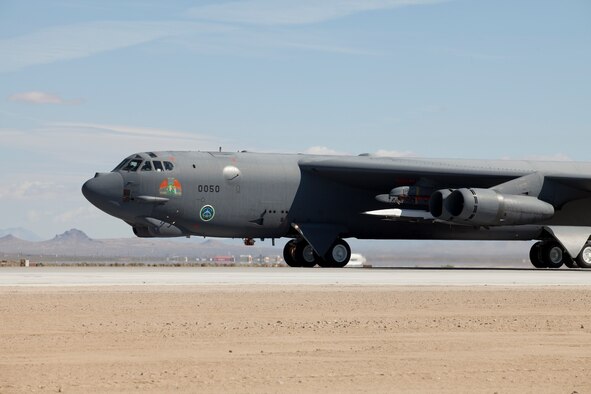 A B-52H carrying an X-51A WaveRider scramjet taxis down a runway at Edwards May 26.  The X-51A was launched from beneath the wing of the B-52H at about 50,000 feet above the Pacific Ocean.  (Air Force photo by Greg Davis)