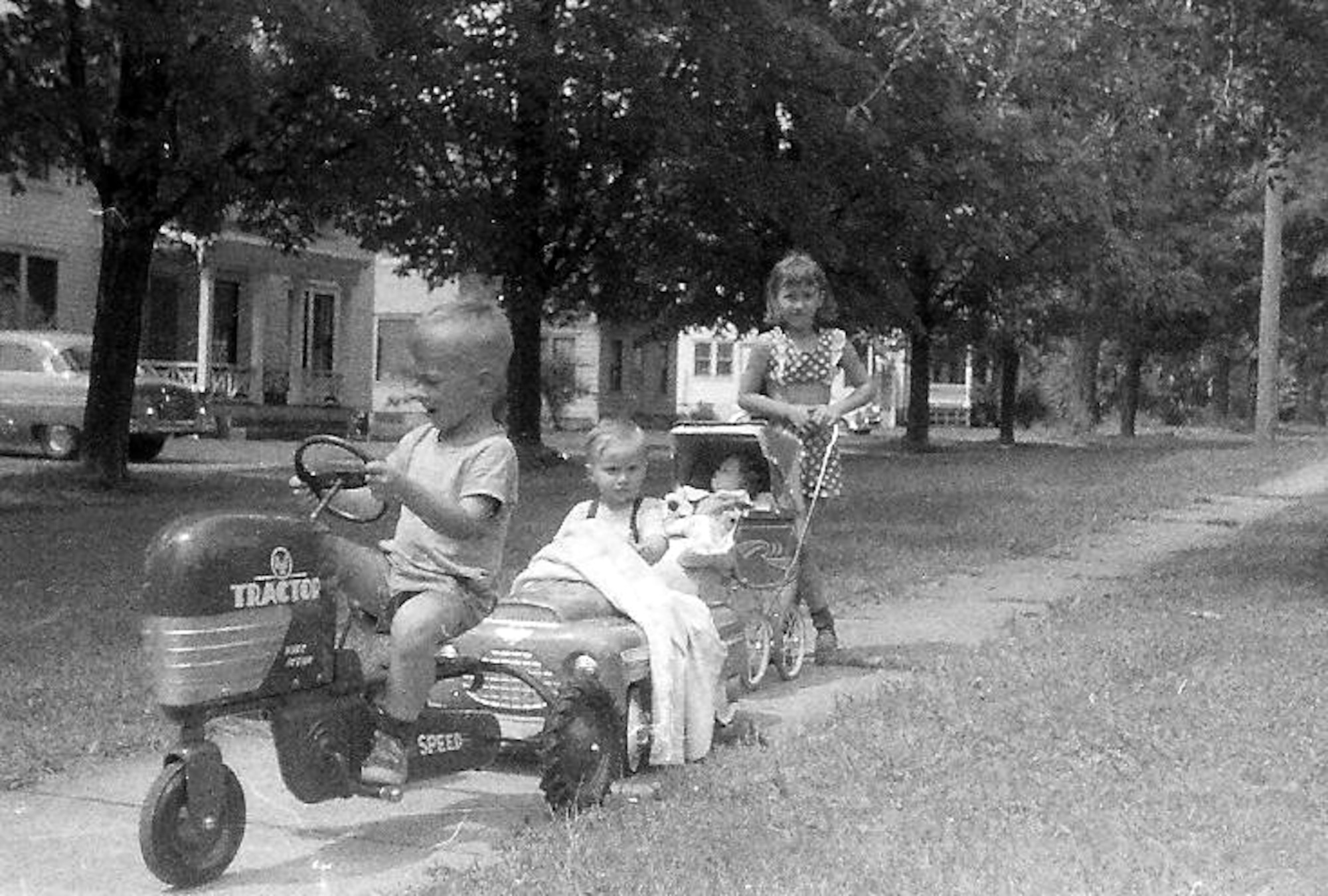 L-R:  Eric, Gary and Janis Crabtree playing in their Cassadaga, N.Y. neighborhood in the late 50s.  Maj. Gen. Eric Crabtree is now commander, Headquarters Fourth Air Force, March Air Reserve Base, Calif.  He began leading troops and giving orders at an early age, as depicted here.  (Courtesy photo)  