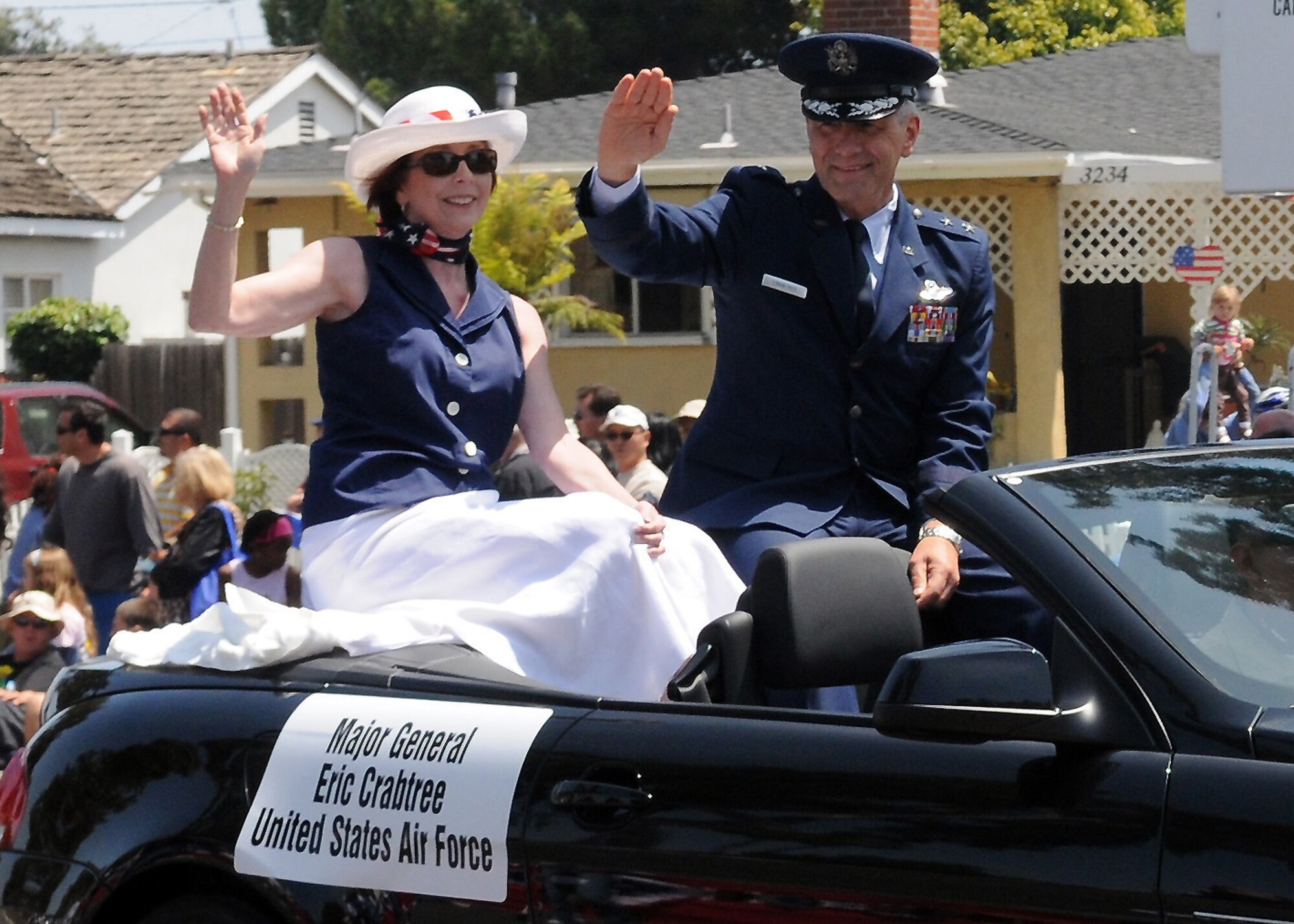 Maj. Gen. Eric Crabtree, Commander, Headquarters Fourth Air Force, March Air Reserve Base, Calif., and his wife, Beth, ride in the 2010 Armed Forces Day parade, Torrance, Calif., May 15.  Torrance is one of the few cities in the nation designated by the U.S. Department of Defense to host an Armed Forces Day celebration.  The parade, the nation's longest running, military parade sponsored by any American city,  is the highlight.  (U.S. Air Force photo/Jim Gordon/Released)