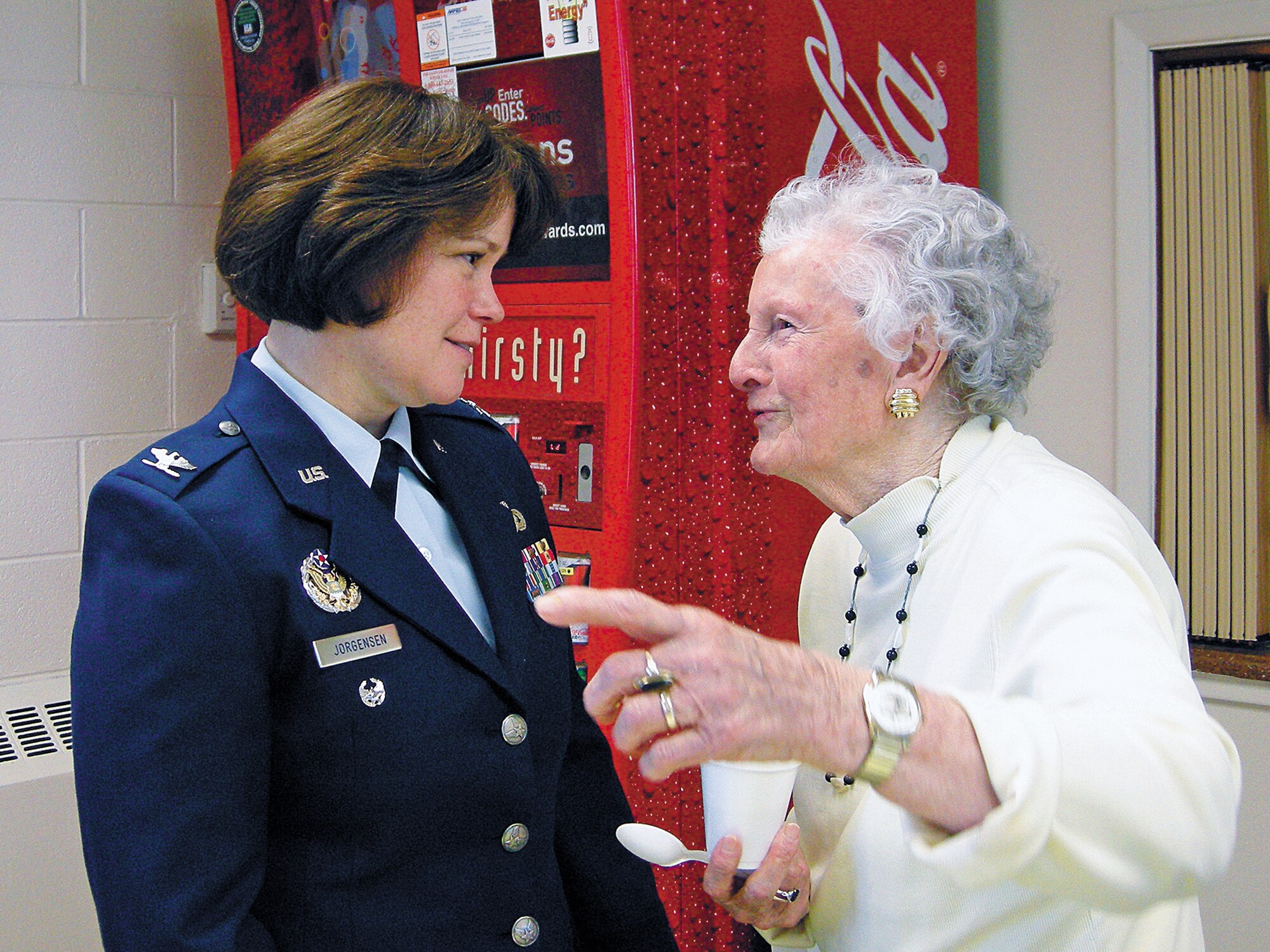 Col. Barbara J. Jorgensen, 377th Air Base Wing vice commander, speaks to Mrs. Anna McCullough, who at the young age of 97 is the “oldest” member of the group. Photo by Marie Vanover