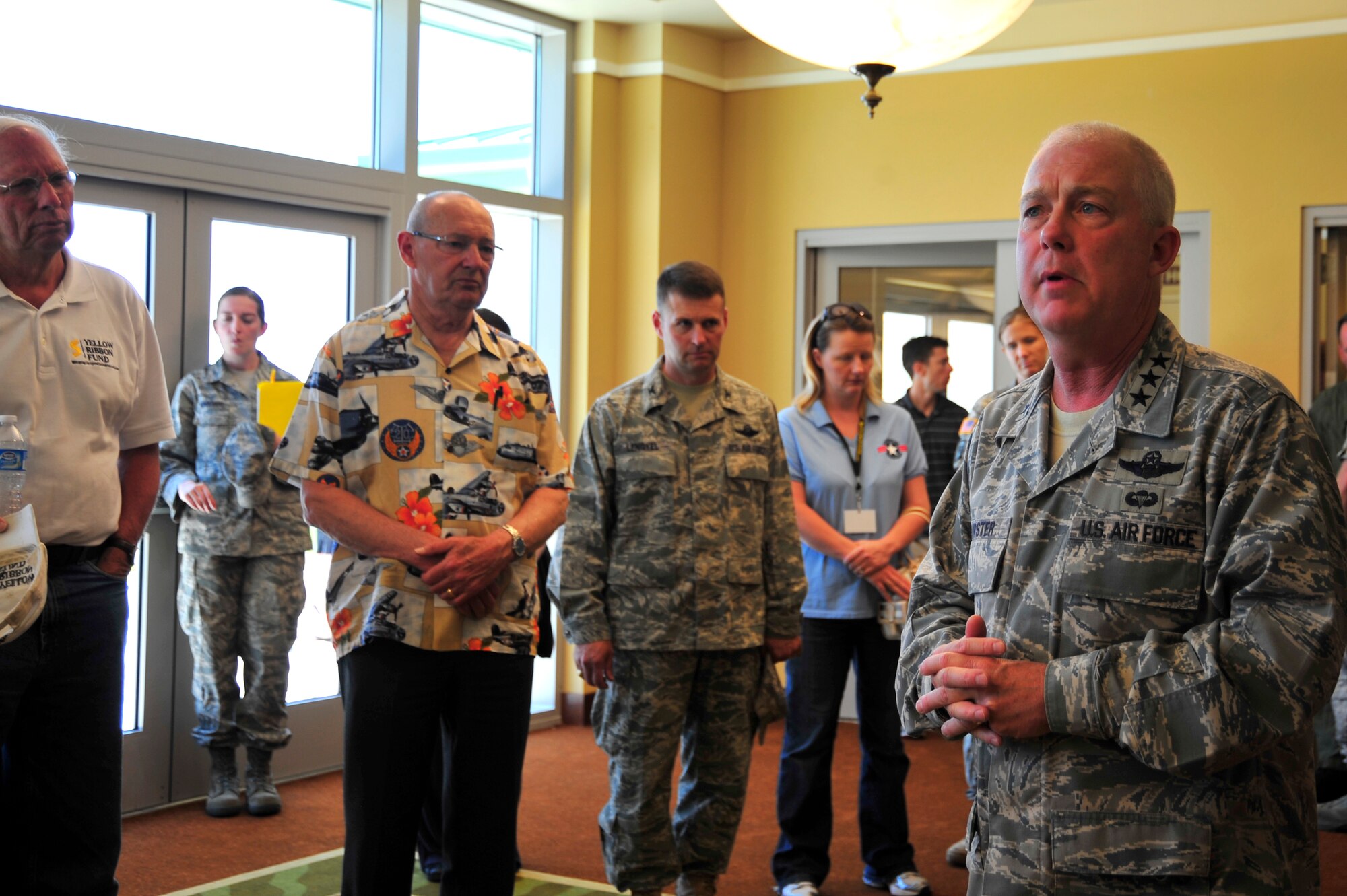 Lt. Gen. Donald Wurster, Air Force Special Operations Command commander, greets members of the US Special Operations Command Care Coalition during their visit to Hurlburt Field to learn about the AFSOC mission May 20, 2010. The Care Coalition, established in 2005, is an advocacy organization that works to enhance the quality of life of wounded USSOCOM service members and their families (DoD photo by Senior Airman Sheila deVera)