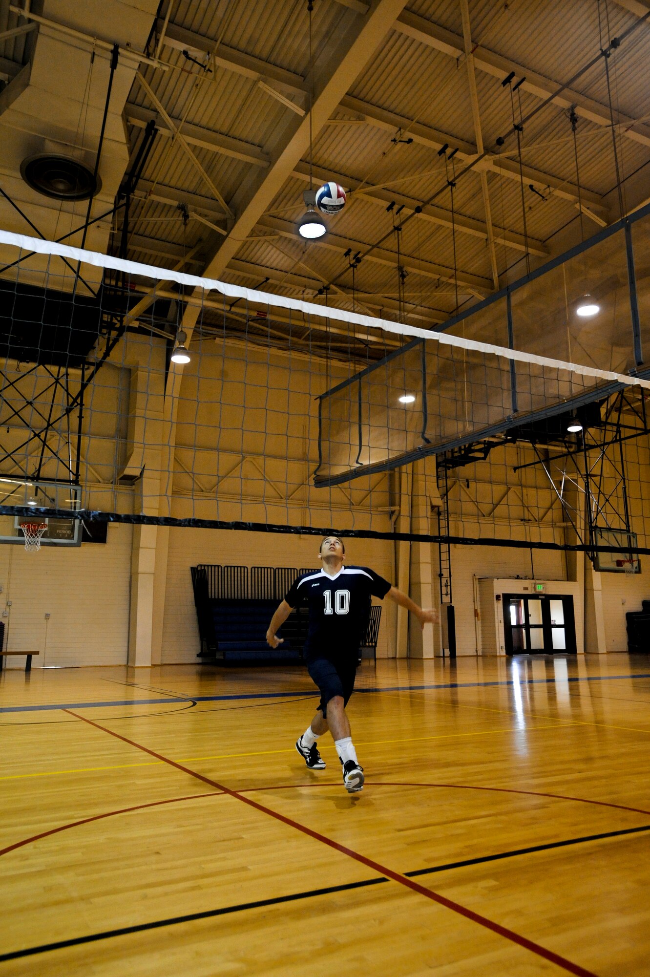 Staff Sgt. Stephen Osinski, 962nd Aircraft Maintenance Unit, practices at the Elmendorf Fitness Center. Sergeant Osinski was a member of the 2010 Air Force Men’s Volleyball Team which won the 2010 All Armed Forces Men’s’ Volleyball Championship. (Air Force photo by Airman 1st Class Jack Sanders)