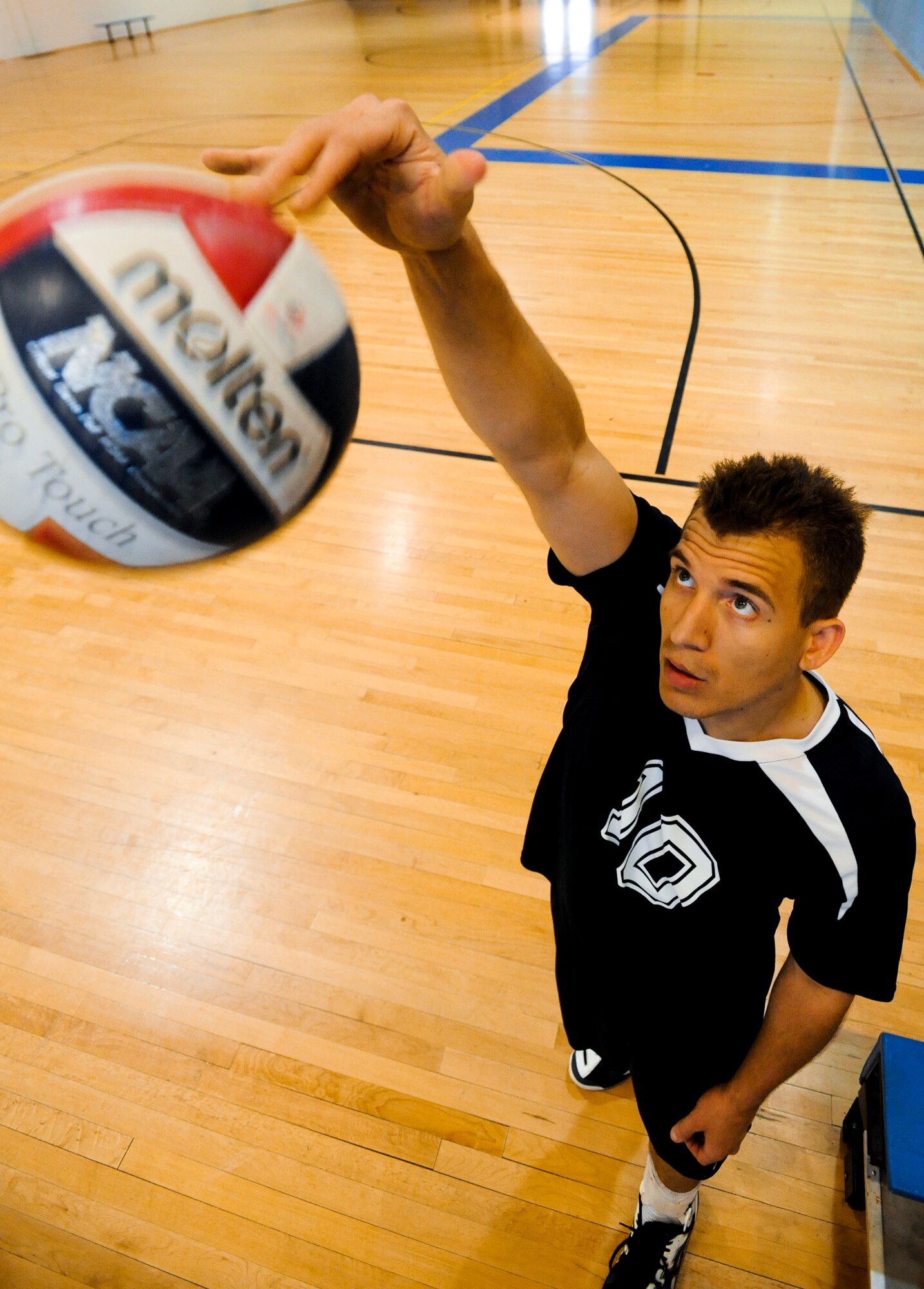 Staff Sgt. Stephen Osinski, 962nd Aircraft Maintenance Unit, practices at the Elmendorf Fitness Center. Sergeant Osinski was a member of the 2010 Air Force Men’s Volleyball Team which won in the 2010 All Armed Forces Men’s’ Volleyball Championship. (Air Force photo by Airman 1st Class Jack Sanders)
