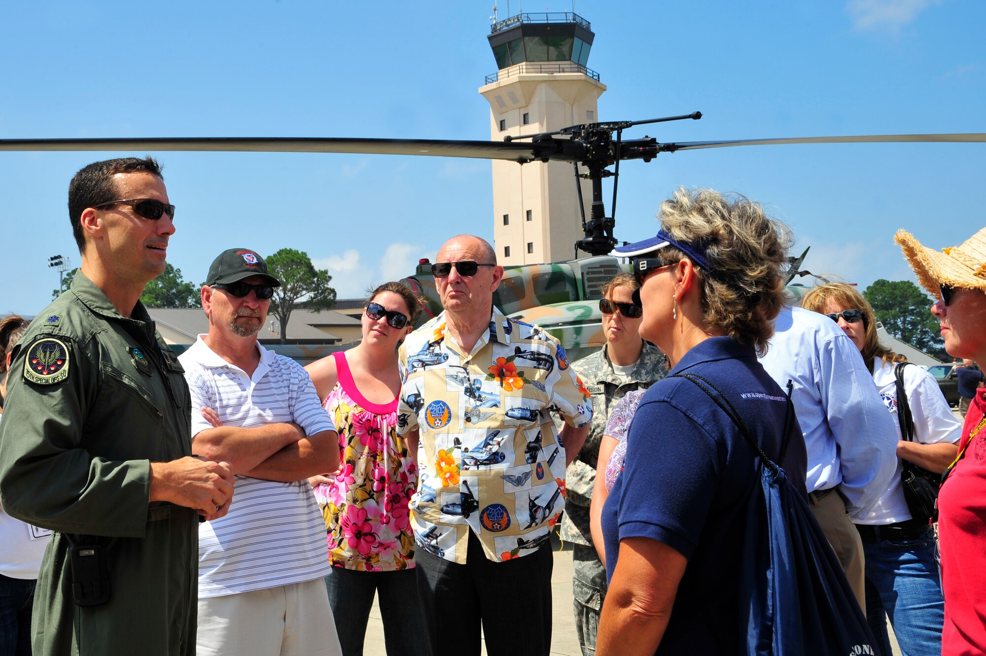 Lt.Col. David Diehl, 15th Special Operations Squadron commander, talks with Care Coalition members during their tour at Hurlburt Field, Fla., May 20, 2010. The Care Coalition is an advocacy organization that works to enhance the quality of life of wounded US Special Operations Command service members and their families. (DoD photo by Senior Airman Sheila deVera)