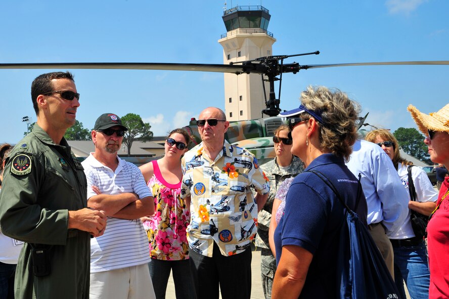 Lt.Col. David Diehl, 15th Special Operations Squadron commander, talks with Care Coalition members during their tour at Hurlburt Field, Fla., May 20, 2010. The Care Coalition is an advocacy organization that works to enhance the quality of life of wounded US Special Operations Command service members and their families. (DoD photo by Senior Airman Sheila deVera)