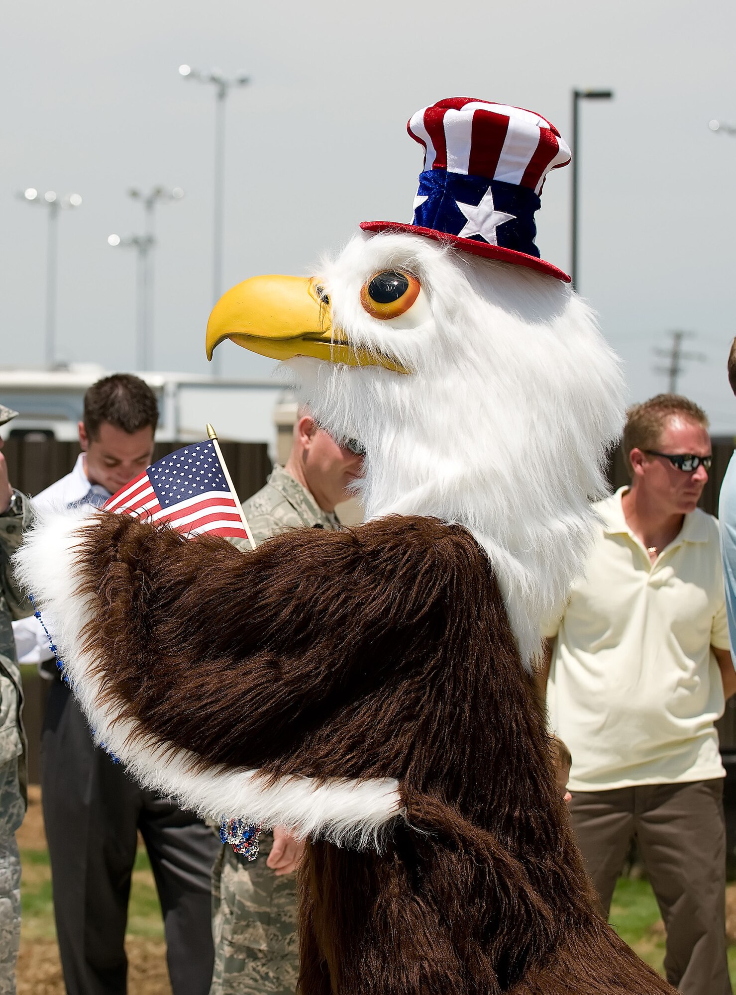 The Outdoor Recreation Center's eagle mascot interacts with the crowd during the ribbon cutting ceremony of the new Outdoor Recreation Center May 21. The Outdoor Recreation Center is much larger than the old building that housed the Information, Tickets and Travel and the Outdoor Recreation offices. (U.S. Air Force photo/Jason Minto)