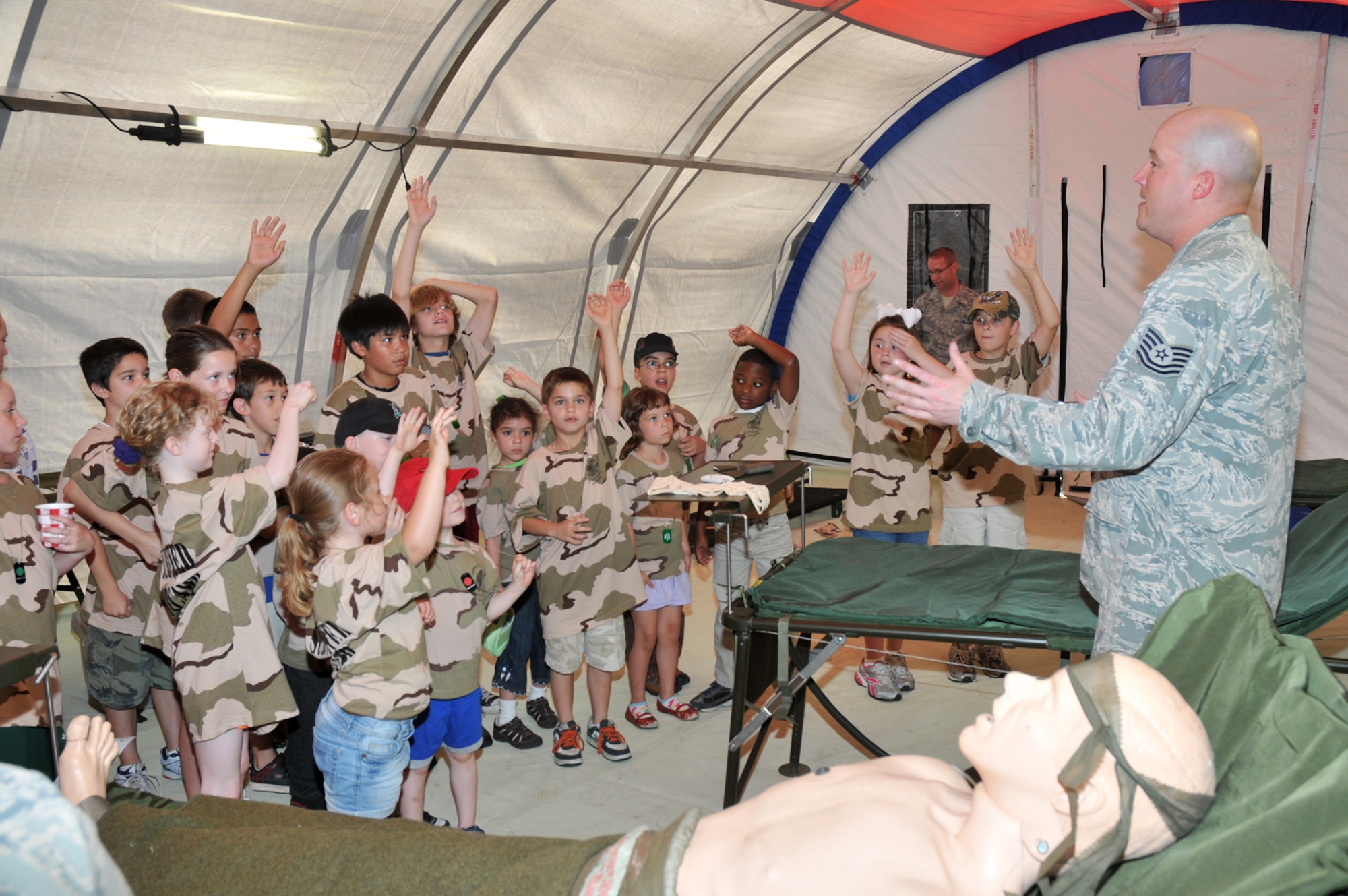 Tech. Sgt. Tommy Mattox, 81st Medical Operations Squadron, asks for volunteers for medical training.  (U.S. Air Force photo by Adam Bond)