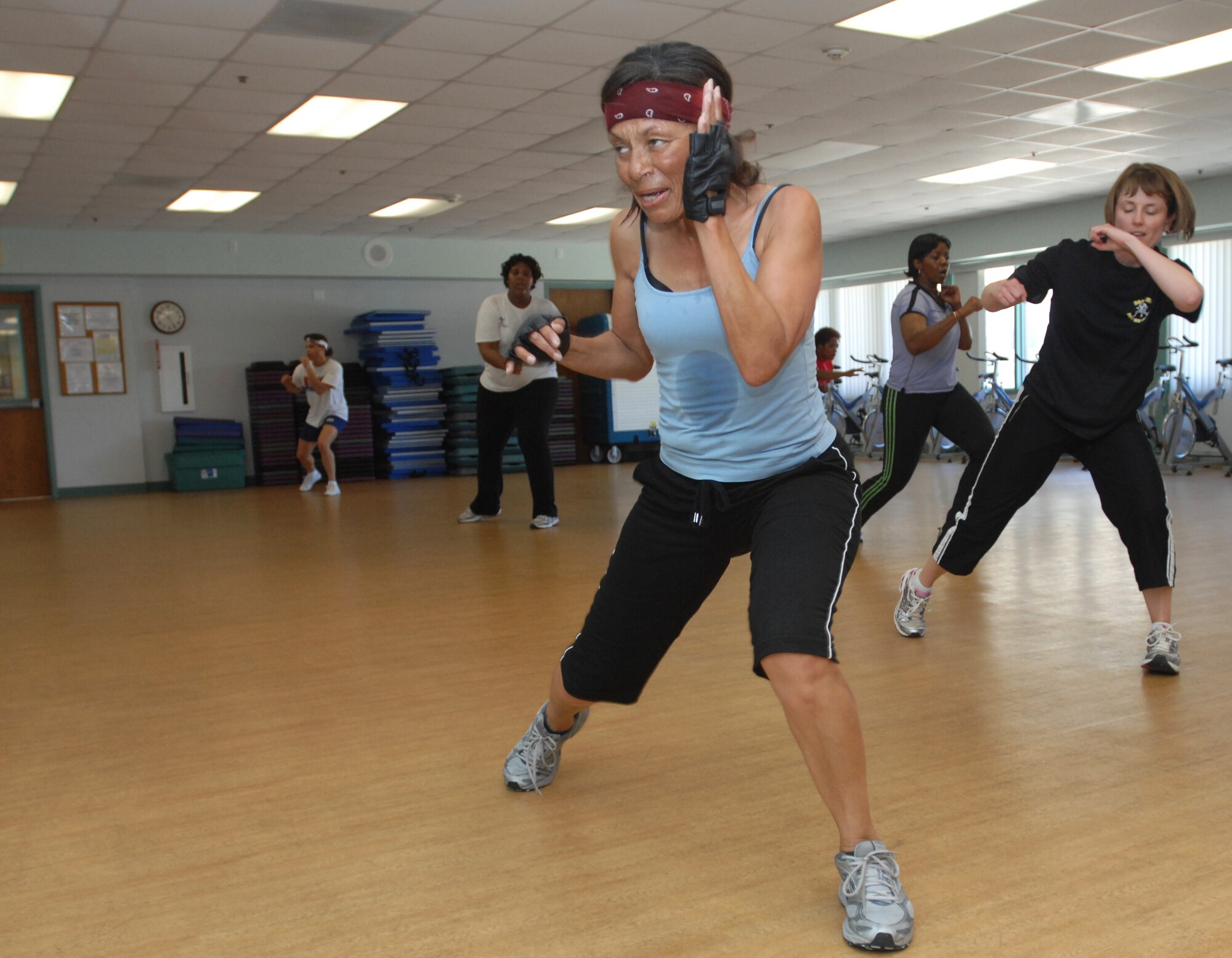 VANDENBERG AIR FORCE BASE, Calif. –Anita Tubbs, the class instructor, leads a cardio kickboxing class at the Airman and  Family Readiness Center here Tuesday, May 25, 2010. Ms. Tubbs is the primary instructor for cardio  kickboxing, total body conditioning, salsa sizzle, and the cycling class. (U.S. Air Force photo/Senior Airman Christopher Hubenthal)