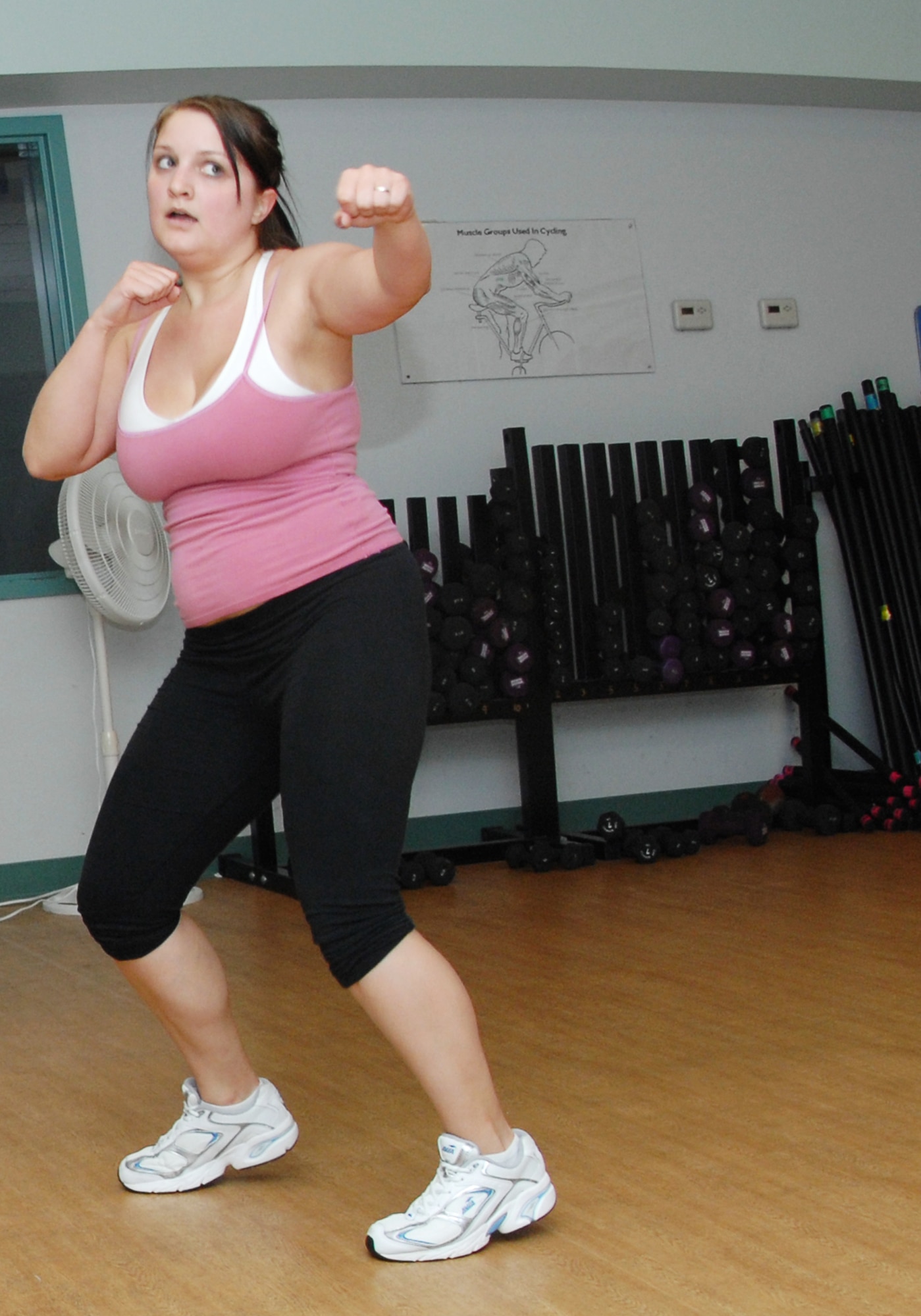 VANDENBERG AIR FORCE BASE, Calif. – Executing a right jab, Courtney Peterson, a military spouse, participates in a cardio kickboxing class at the Airman and Family Readiness Center here Tuesday, May 25, 2010. Cardio kickboxing is offered every Tuesday and Thursday at noon. (U.S. Air Force photo/Senior Airman Christopher Hubenthal)