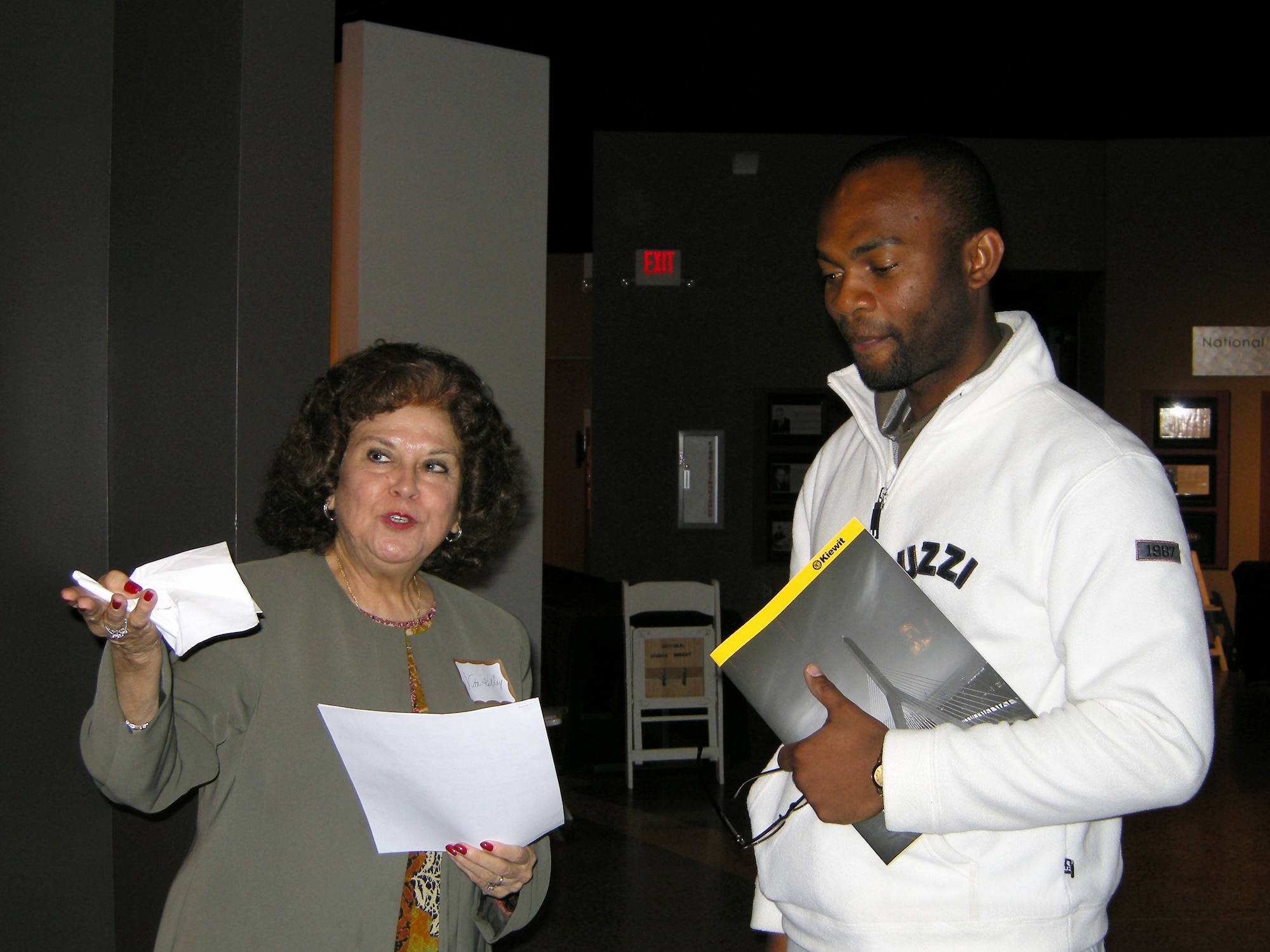 Vita Kelly, left, Chief, 377th Air Base Wing Education and Training Flight, talks with a prospective employee at the May 7 Career Opportunity event held at the National Museum of Nuclear Science and History. Photo by Marie Vanover