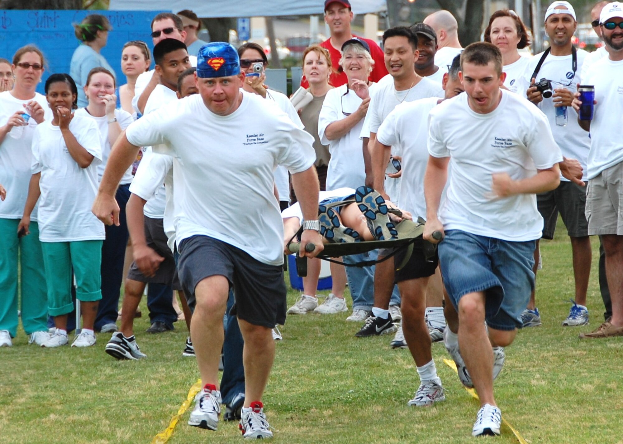 The Keesler team takes off down the course in the Litter Relay.  (U.S. Air Force photo by Steve Pivnick)