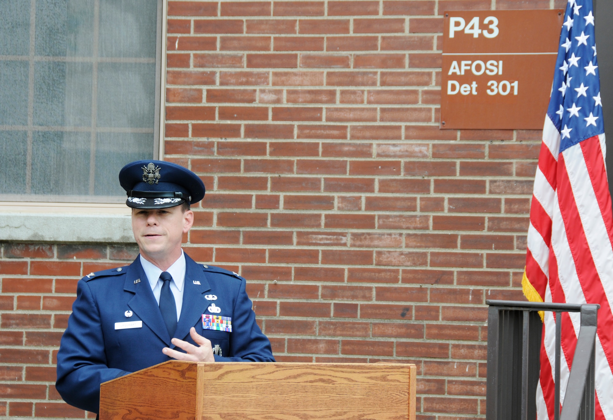 SCOTT AIR FORCE BASE, Ill. -- Col. Wil Urquhart, AFOSI Det. 301 commander, speaks during the Thomas Crowell Building dedication May 21 at Scott. Agent Crowell was the first Airman from Scott to be killed during Operation iraqi Freedom. (U.S. Air Force photo by Staff Sgt. Brian Ellis) 