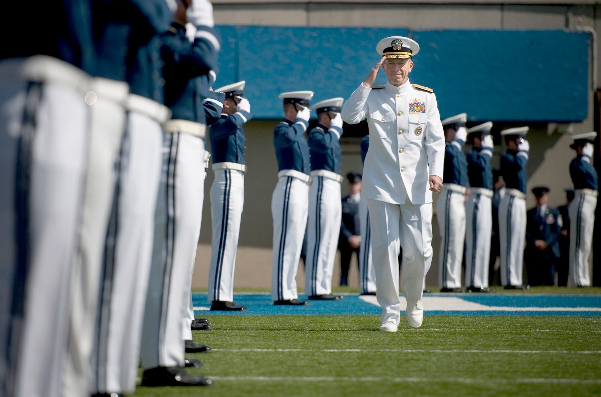The Chairman of the Joint Chiefs of Staff Adm. Mike Mullen arrives at the U.S. Air Force Academy's Falcon Stadium for graduation ceremony May 26, 2010. Admiral Mullen is the first Joint Chiefs chairman to deliver the Academy's commencement address. (U.S. Navy photo/Petty Officer Chad J. McNeeley)