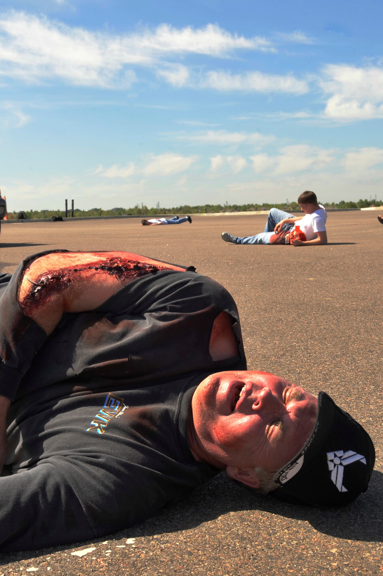 BUCKLEY AIR FORCE BASE, Colo. -- Douglas Carroll, 460th Space Wing director of staff, volunteers as a victim of a mock terrorist attack during an All-Hazards Response Training exercise May 21. All "casualties" were evaluated and cared for by Buckley emergency responders. (U.S. Air Force photo by Airman 1st Class Paul Labbe)