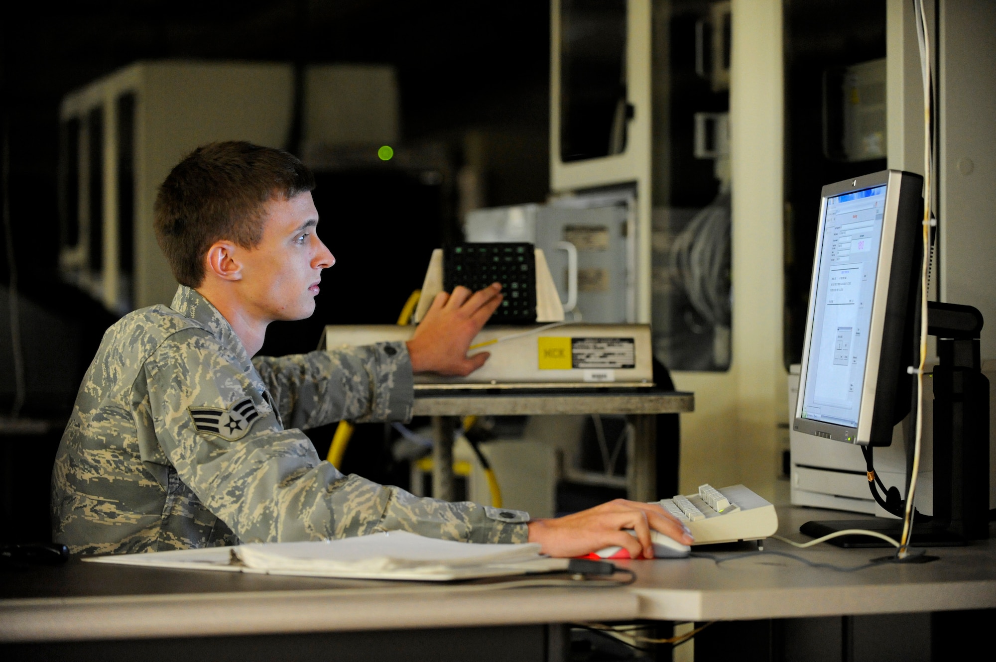 Senior Airman Daniel Teel tests a C-17 Globemaster III data entry keyboard May 25, 2010, at Joint Base Charleston, S.C. Airman Teel is a test station and components journeyman with the 437th Maintenance Squadron. (U.S. Air Force photo/James M. Bowman)
