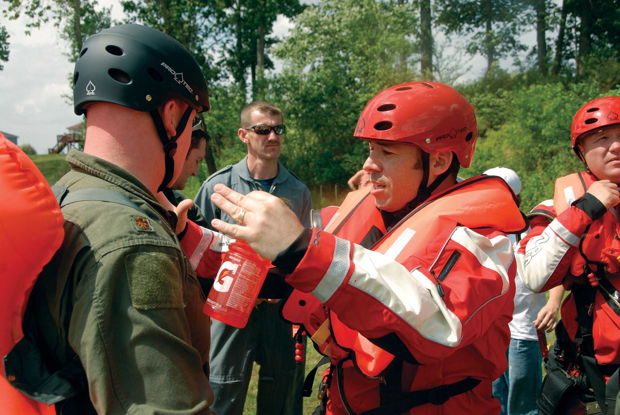 Craig Pruett of the Alabama Department of Public Safety's Crisis Response Team shows Maj. David Kirby of CAP-USAF a couple of tricks. Both Wingmen and state tropers enjoyed the rare joint-training opportunity.  (Air Force photo by Gene H. Hughes)