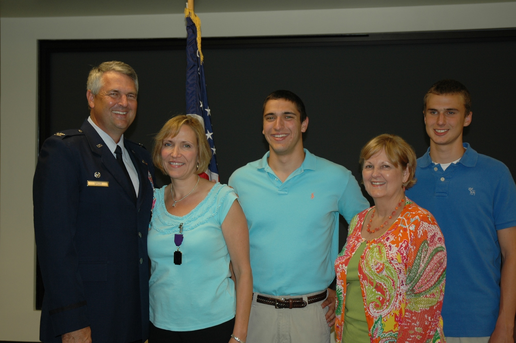 Colonel Mike Speer, outgoing vice commander, 315th Airlift Wing Charleston Air Force Base, S.C. received the Legion of Merit Award May 26 with wife Barb, sons Andrew and Mike and mother Sally in attendance. Barb Speer also received the Spouses Medal during the ceremony held in the 315th AW headquarters building. (U.S. Air Force Photo/2nd Lt Joe Simms)