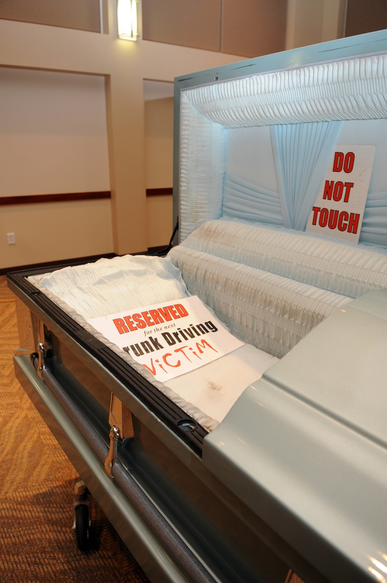 BUCKLEY AIR FORCE BASE, Colo. -- A coffin displays a reserved sign for the next drunk driving victim during the Safe-a-Life Tour May 20 at the Leadership Development Center. ( U.S. Air Force Photo by Airman 1st Class Marcy Glass )
