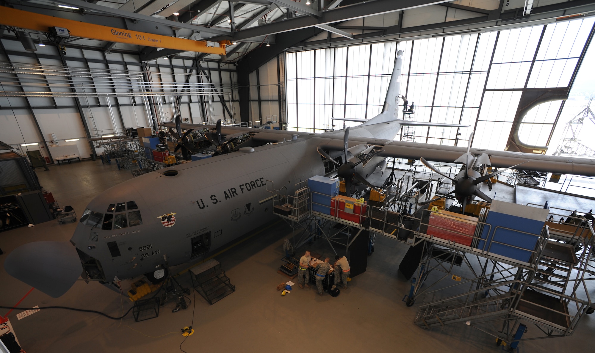 The 86th Maintenance Squadron Isochronal Inspection Team performs an inspection on a C-130J, Ramstein Air Base, Germany, May 26, 2010. This is the first C-130J all active duty isochronal inspection done by the Air Force. (U.S. Air Force Photo by Airman 1st Class Caleb Pierce)