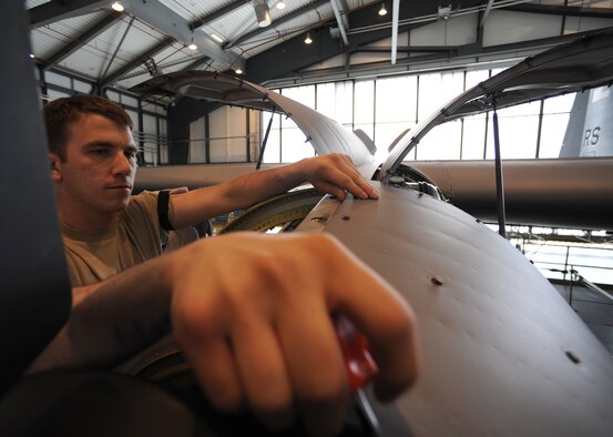 U.S. Air Force Staff Sgt. Joshua Coe, 86th Maintenance Squadron isochronal engine maintainer, depanels a turboprop on a C-130J during an isochronal inspection, Ramstein Air Base, Germany, May 26, 2010. This is the first C-130J all active duty isochronal inspection done in the Air Force. (U.S. Air Force Photo by Airman 1st Class Caleb Pierce)