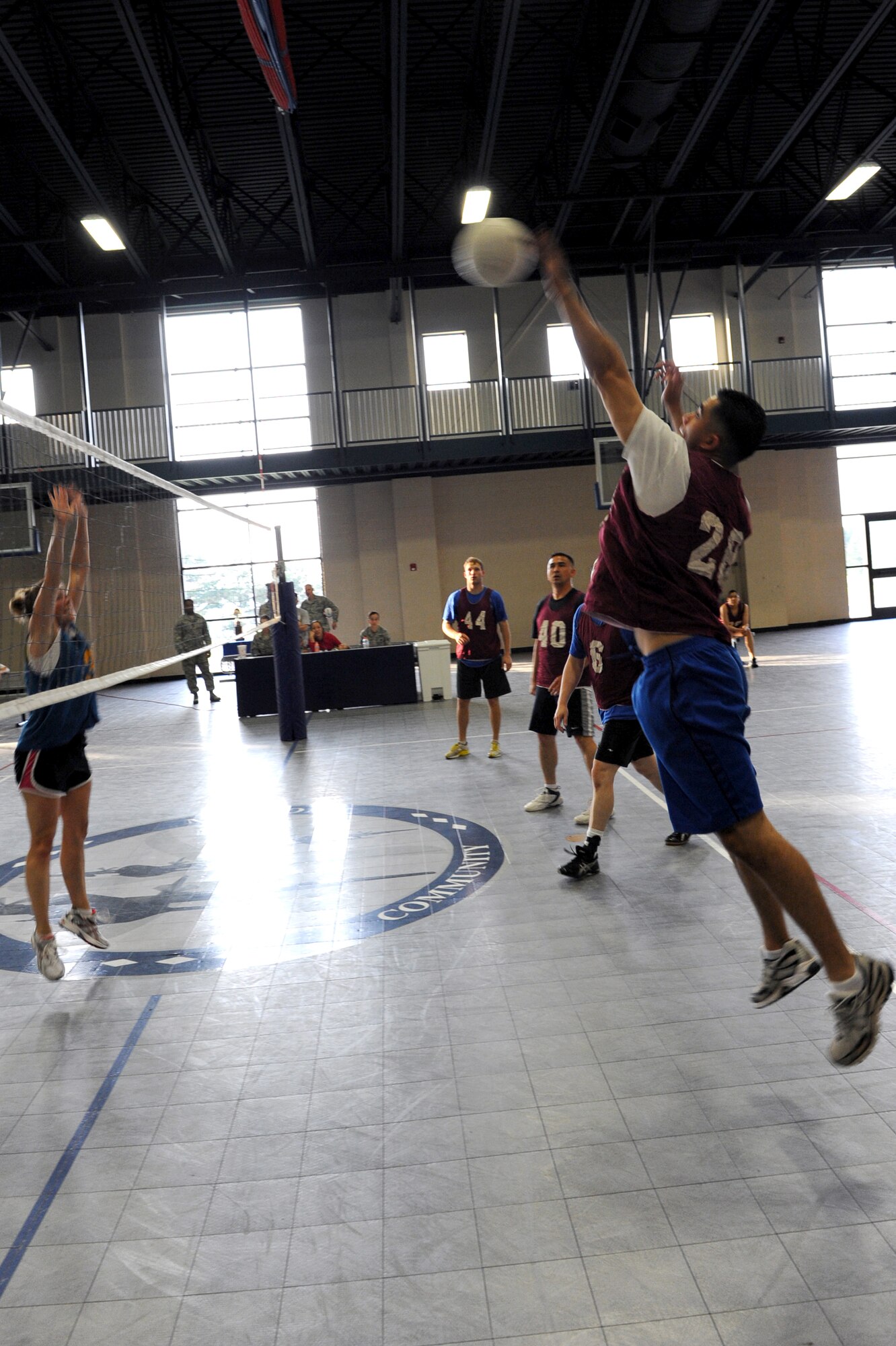 Noe Rodriguez, 19th Equipment Maintenance Squadron team member, spikes the ball during the base’s intramural volleyball championship May 19 at the base fitness center. The 19th EMS defeated the 19th Operations Support Squadron 4 out of 6 sets to 25 points. (U.S. Air Force photo by Senior Airman Ethan Morgan)