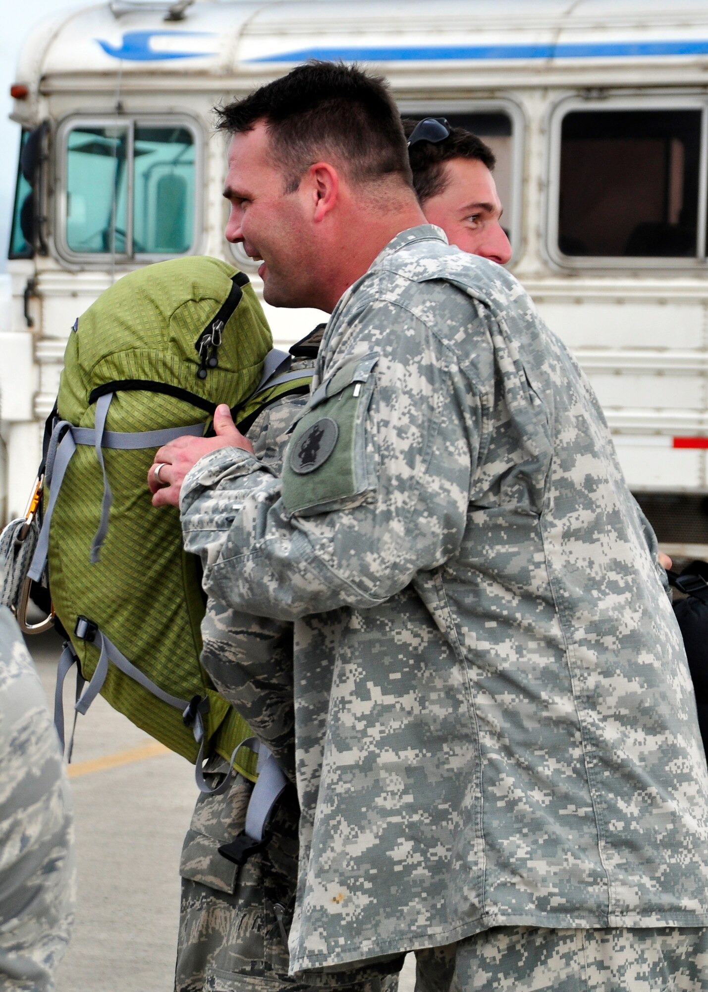 Major Daniel Elliot, Army Forces Battalion Operations Officer, welcomes back Capt. David Hein, Personnel Recovery Director, who returned May 24 from supporting Joint Task Force-Haiti. The 1/228th along with other members of JTF-Bravo deployed in the middle of March from Soto Cano Air Base, Honduras to support JTF-Haiti, the U.S. military support unit for Operation Unified Response. (U.S. Air Force photo/Staff Sgt. Bryan Franks)