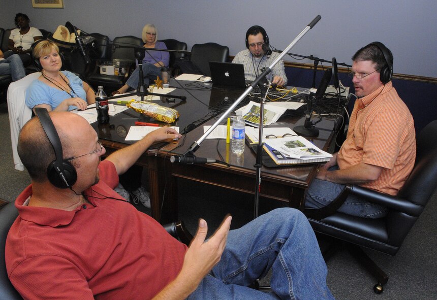 Steve McCartney, bottom left, talks about his spinal injury with Twyla South, Mike Miller and Charles Wheeler during a taping of the Twyla and Chuck Show. U. S. Air Force photo by Sue Sapp