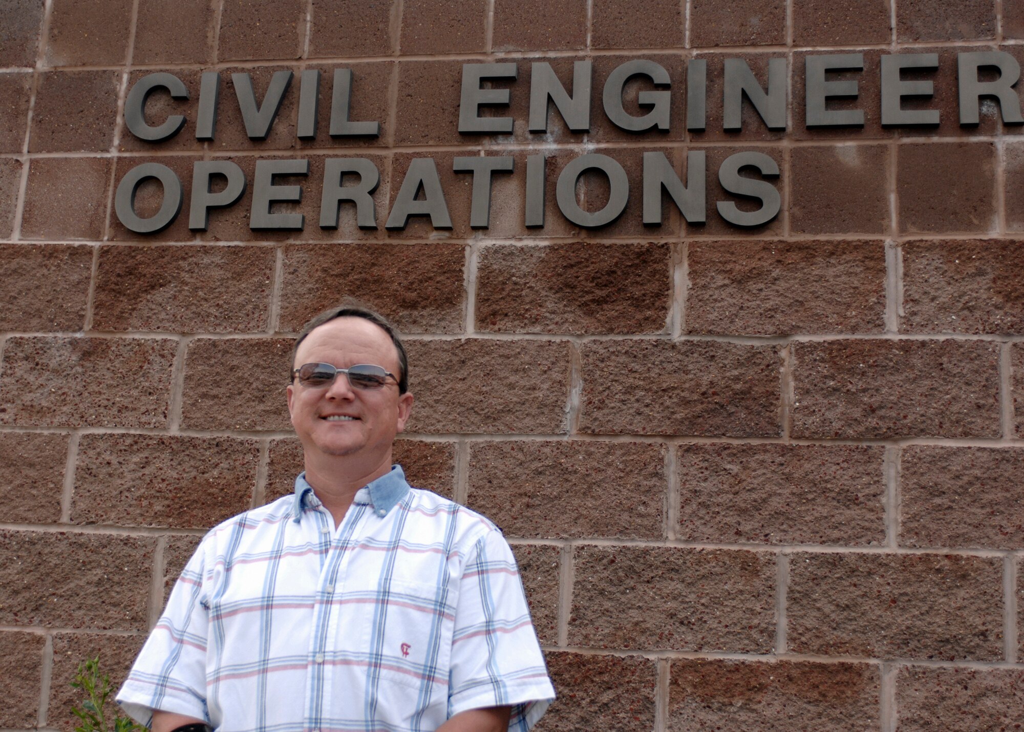 Barry King, an industrial electronic control mechanic for the 27th Special Operations Civil Engineer Squadron, was selected as the Category III Civilian of the Year for the Air Force Special Operations Command. Mr. King said that one of his achievements last year that he was glad to accomplish was the repair of  a dormitory air conditioning system for Airmen. (Air Force photo by Greg Allen)