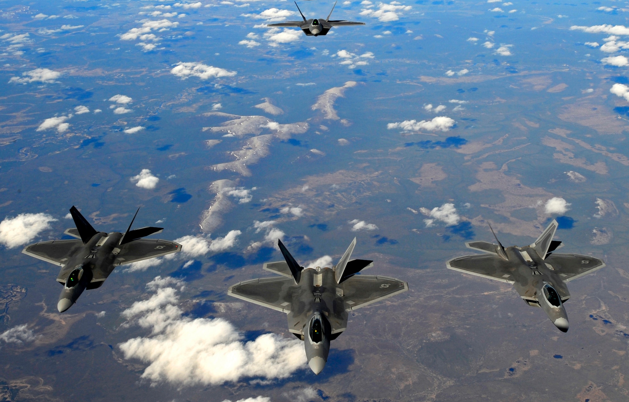 F-22 Raptors from Elmendorf Air Force Base fly over Alaska May 26. (U.S. Air force photo/Staff Sgt. Brian Ferguson)