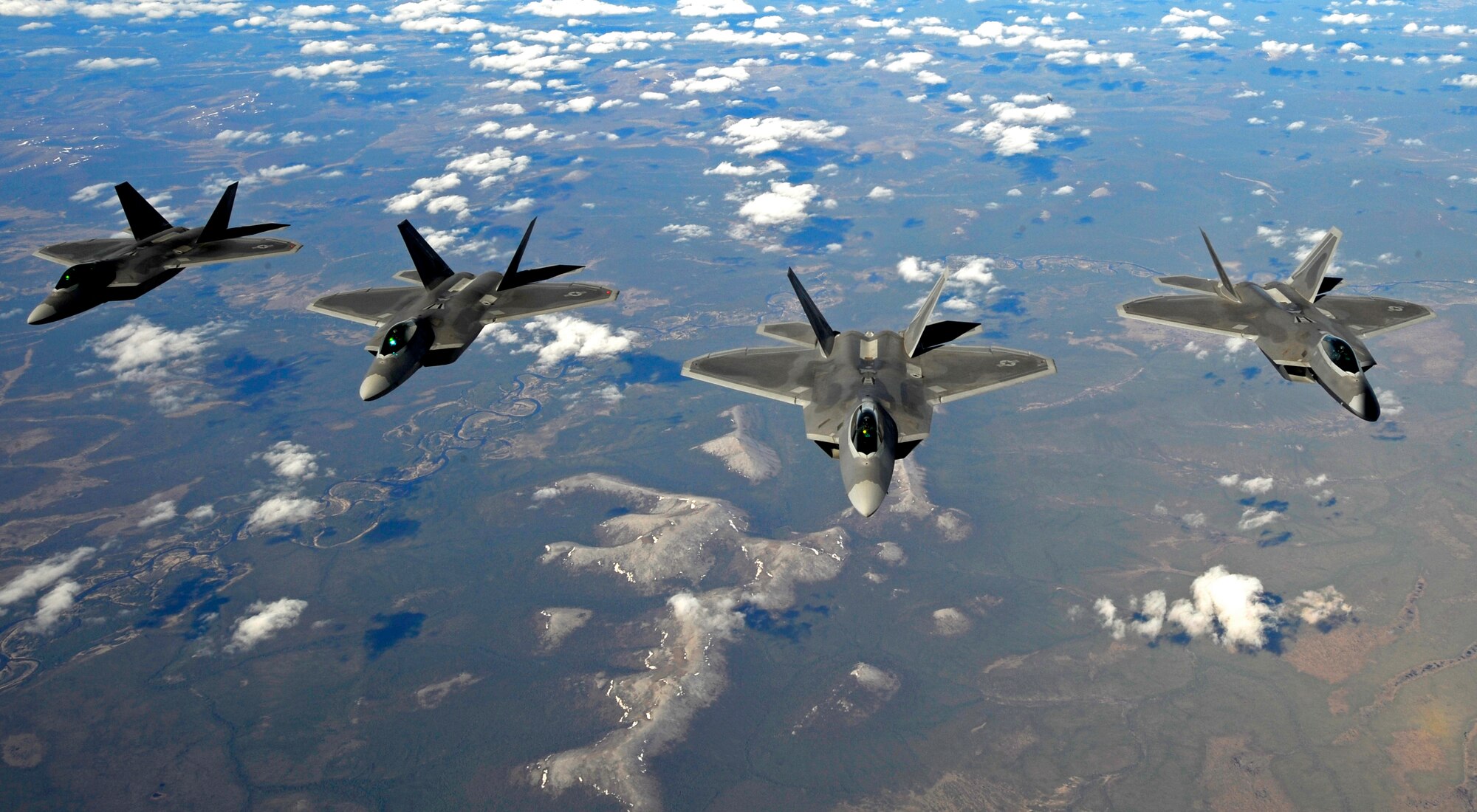 F-22 Raptors from Elmendorf Air Force Base fly over Alaska May 26. (U.S. Air force photo/Staff Sgt. Brian Ferguson)