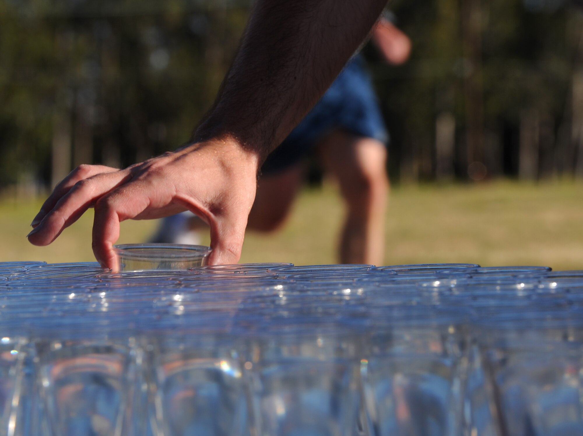 VANDENBERG AIR FORCE BASE, Calif. -- After finishing up, water is made available for the Airmen in order to stay hydrated after the 30th Space Wing 5K Fit-to-Fight Run here Thursday, May 27, 2010. In an effort to show wingman support, Airmen waited for the very last runner to make it to the finish-line. (U.S. Air Force photo/ Senior Airman Ashley Reed)