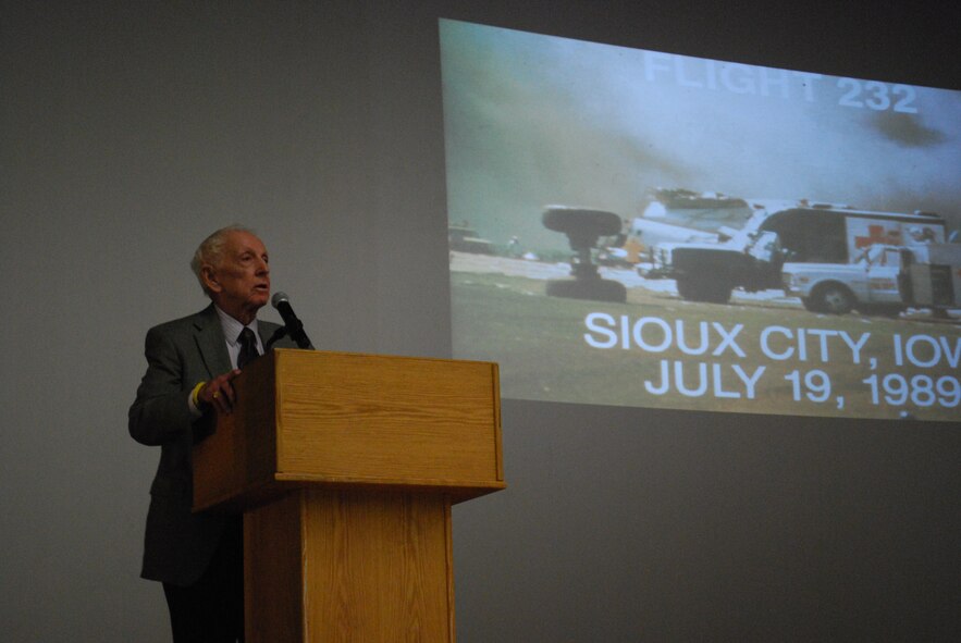 Captain Al Haynes, retired United Airlines pilot and hero of United Flight 232, shares his personal accounts with more than 500 Airmen on “Teamwork in Crisis” during his visit to Travis AFB on May 19.  On July 19, 1989, Haynes piloted his DC-10 from Denver, CO to Chicago, Ill. with 296 passengers and crew on board.  During the flight, the aircraft lost complete hydraulics functions and the aircraft crashed landed onto the Sioux City Airport runway in Sioux City, Iowa.  Haynes’ experience and calmness under pressure saved the lives of 184 passengers that day.  He retired from United Airlines two years after the incident and began touring the country talking about his experiences.   He has done about a thousand presentations over the last ten years.  (U.S. photo by Capt. Paradon Silpasornprasit)