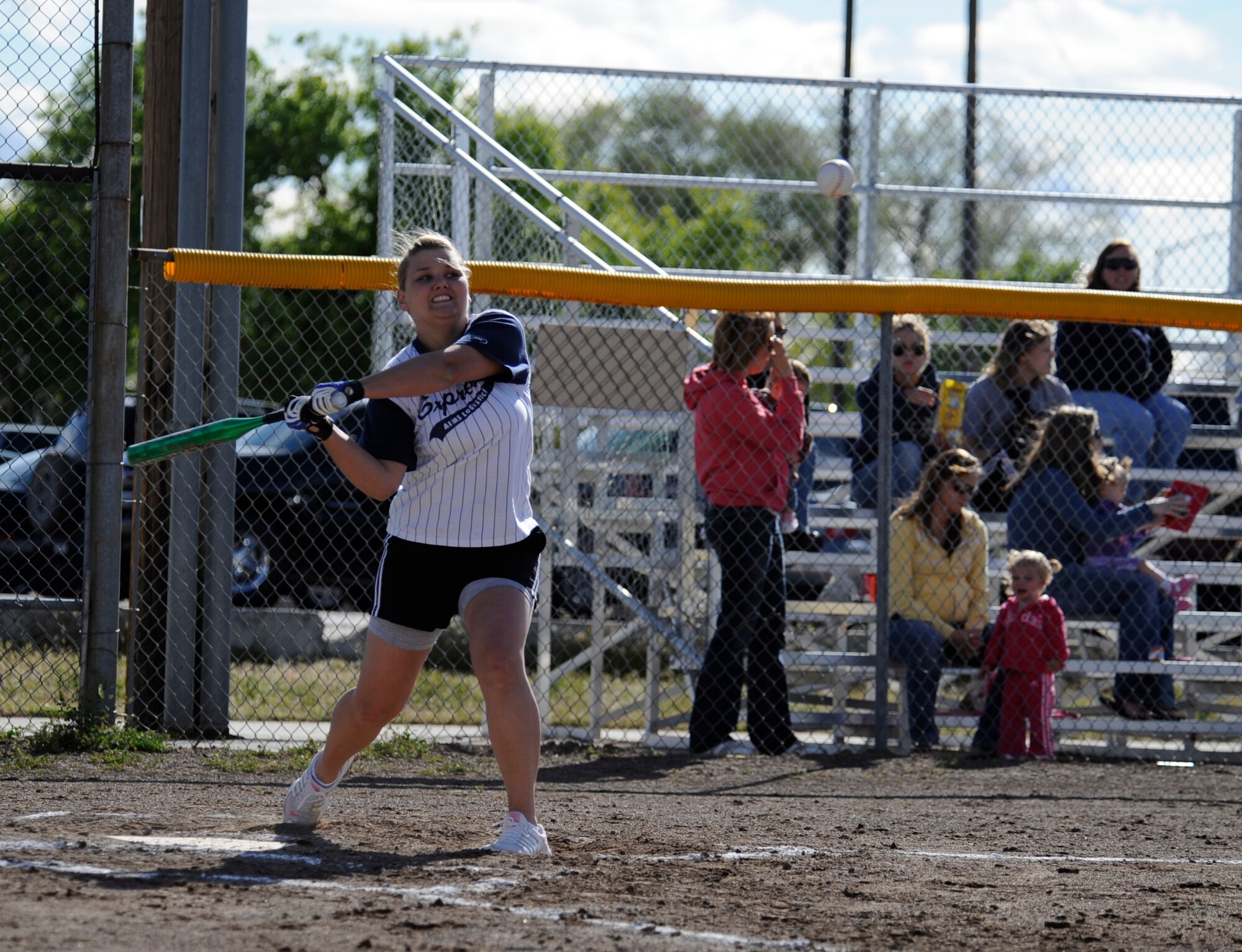 MOUNTAIN HOME AIR FORCE BASE, Idaho -- Kristen Dyer, 366th Operational Support Squadron catcher, takes a swing during an intramural softball game against the Security Forces Squadron May 24. SFS opened the season with a win over OSS 9-5. (U.S. Air Force photo by Airman 1st Class Renishia Richardson)