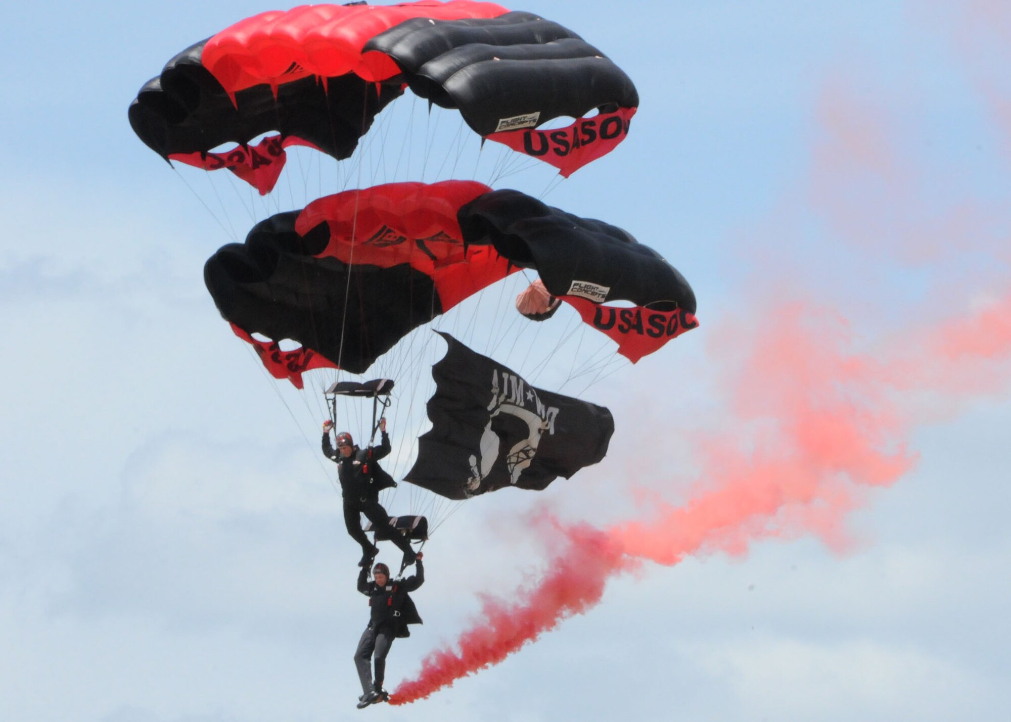 Two members of the U.S. Special Operations Command's Black Daggers parachute team drop in at the Military Appreciation Recognition Celebration May 15 at Old Spanish Trail Park in Crestview.  Likewise, several units from Duke Field's 919th Special Operations Wing brought out various displays of military equipment for the public to see.  The MARC is a non-profit organization seeking to honor past and present military members of all branches during the Armed Forces Day weekend. (U.S. Air Force photo/Adam Duckworth)