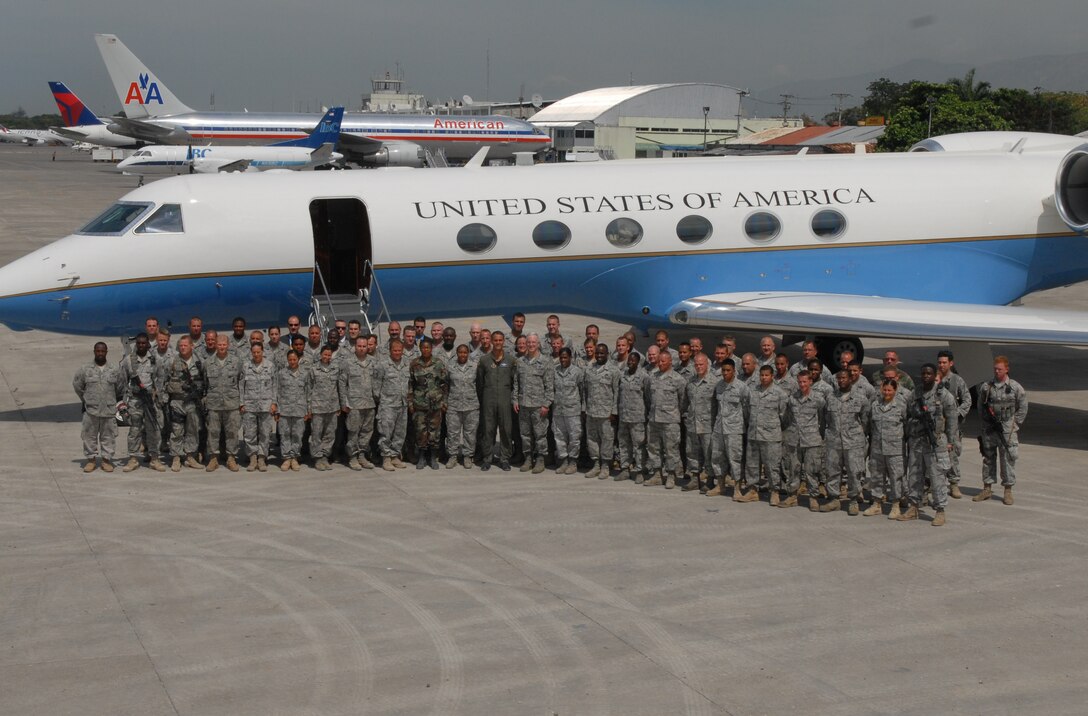 Col. David Heroux, the 24th Air Expeditionary Group commander and Westover's safety officer, stands next to Gen. Douglas M. Fraser, Commander of U.S. Southern Command, during the general's visit to the Toussaint L?Ouverture International Airport, in Port au Prince, May 3.  Colonel Heroux took command of the 24th AEG March 13. 
