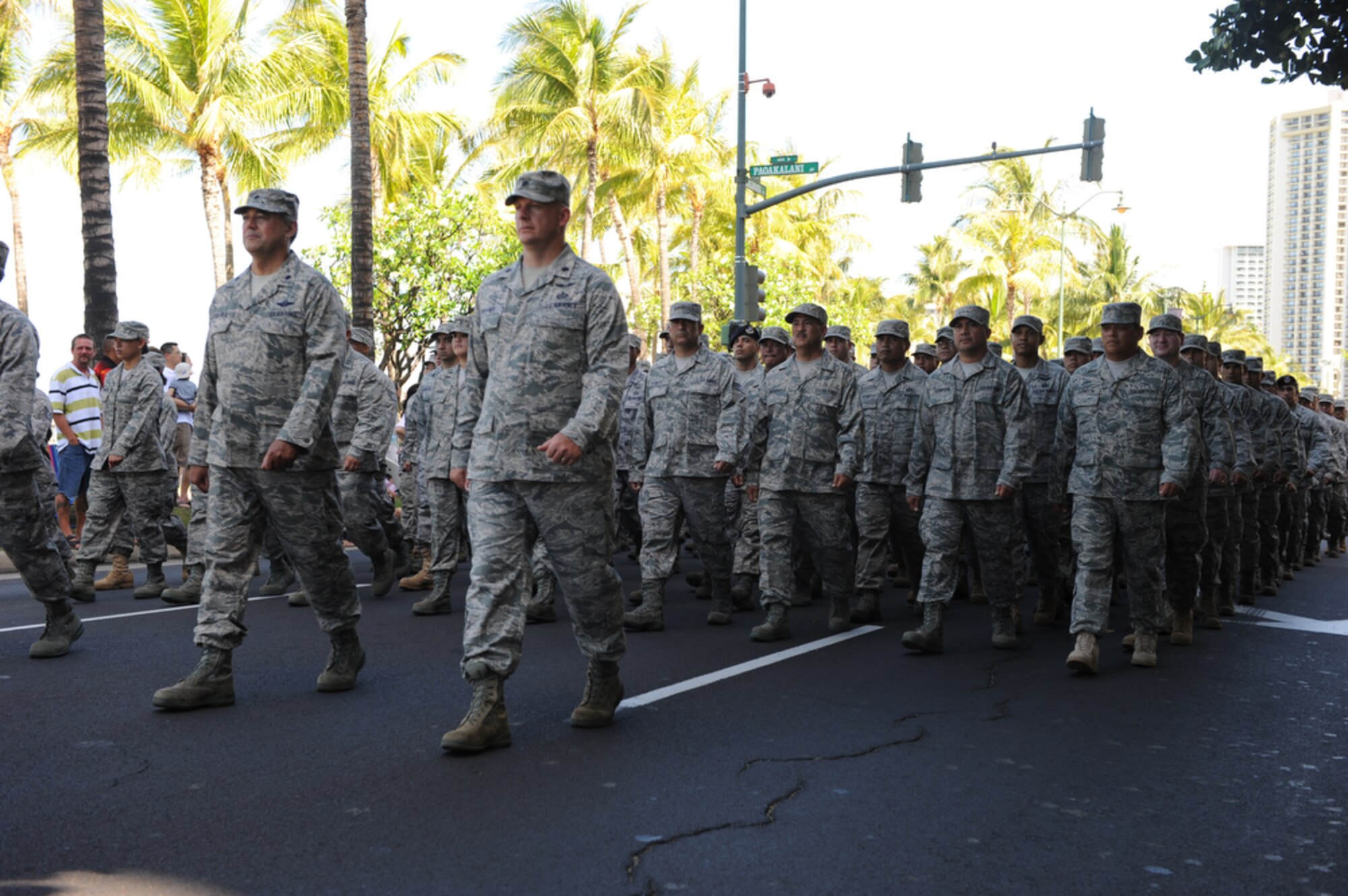 HONOLULU - Airmen from the Hawaii Air National Guard at Joint Base Pearl Harbor-Hickam, Hawaii march in a Welcome Home Parade during Military Appreciation Day in Honolulu on May 22. Active duty, guard and reserve personnel from the Army, Navy, Air Force, Marines and Coast Guard participated in the parade, which was followed up with entertainment at the Waikiki Shell with performances by four local Hawaii bands and a military joint jazz ensemble. The event was organized by the USO, the Chamber of Commerce Military Affairs Council and BAE Systems. (U.S.  Air Force photo/Tech Sgt. Cohen A. Young)