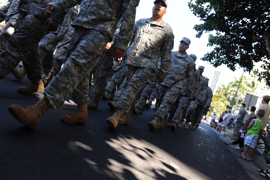 HONOLULU - Soldiers from Schoefield Barracks, Hawaii march in a Welcome Home Parade during Military Appreciation Day in Honolulu on May 22. Active duty, guard and reserve personnel from the Army, Navy, Air Force, Marines and Coast Guard participated in the parade, which was followed up with entertainment at the Waikiki Shell with performances by four local Hawaii bands and a military joint jazz ensemble. The event was organized by the USO, the Chamber of Commerce Military Affairs Council and BAE Systems. (U.S.  Air Force photo/Tech Sgt. Cohen A. Young)