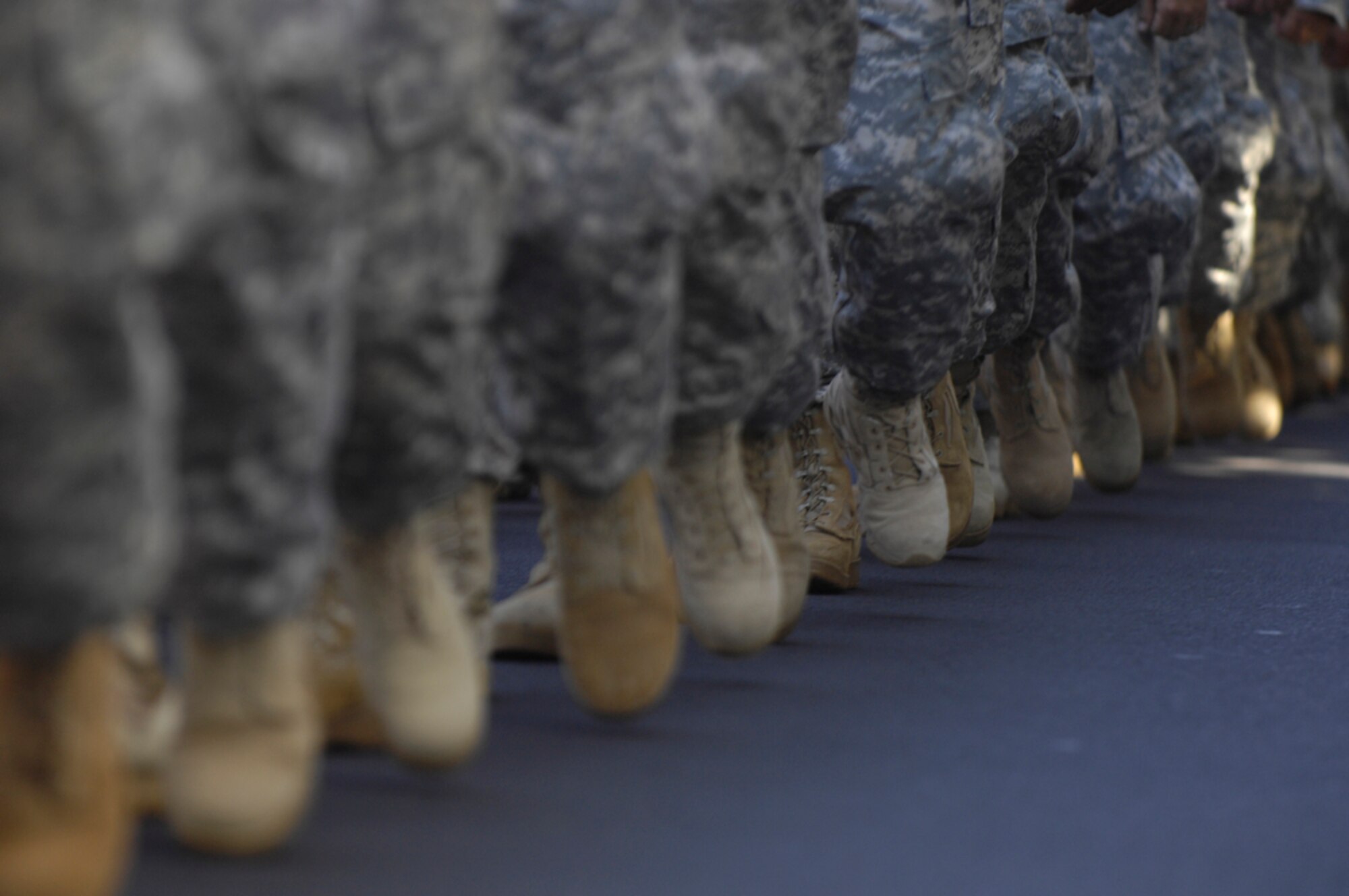 HONOLULU - A formation of Soldiers from Schoefield Barracks, Hawaii walk by   during a Welcome Home Parade during Military Appreciation Day in Honolulu on May 22. Active duty, guard and reserve personnel from the Army, Navy, Air Force, Marines and Coast Guard participated in the parade, which was followed up with entertainment at the Waikiki Shell with performances by four local Hawaii bands and a military joint jazz ensemble. The event was organized by the USO, the Chamber of Commerce Military Affairs Council and BAE Systems. (U.S.  Air Force photo/Tech Sgt. Cohen A. Young)